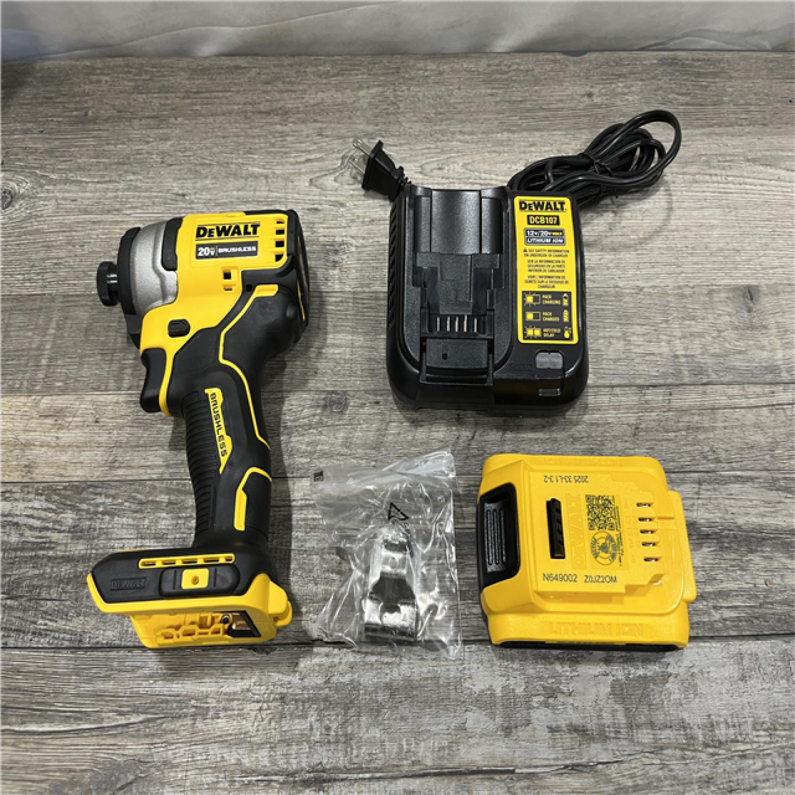 AS-IS DEWALT Atomic 20V Max Lithium-Ion Brushless Cordless Compact 1/4 in. Impact Driver Kit
