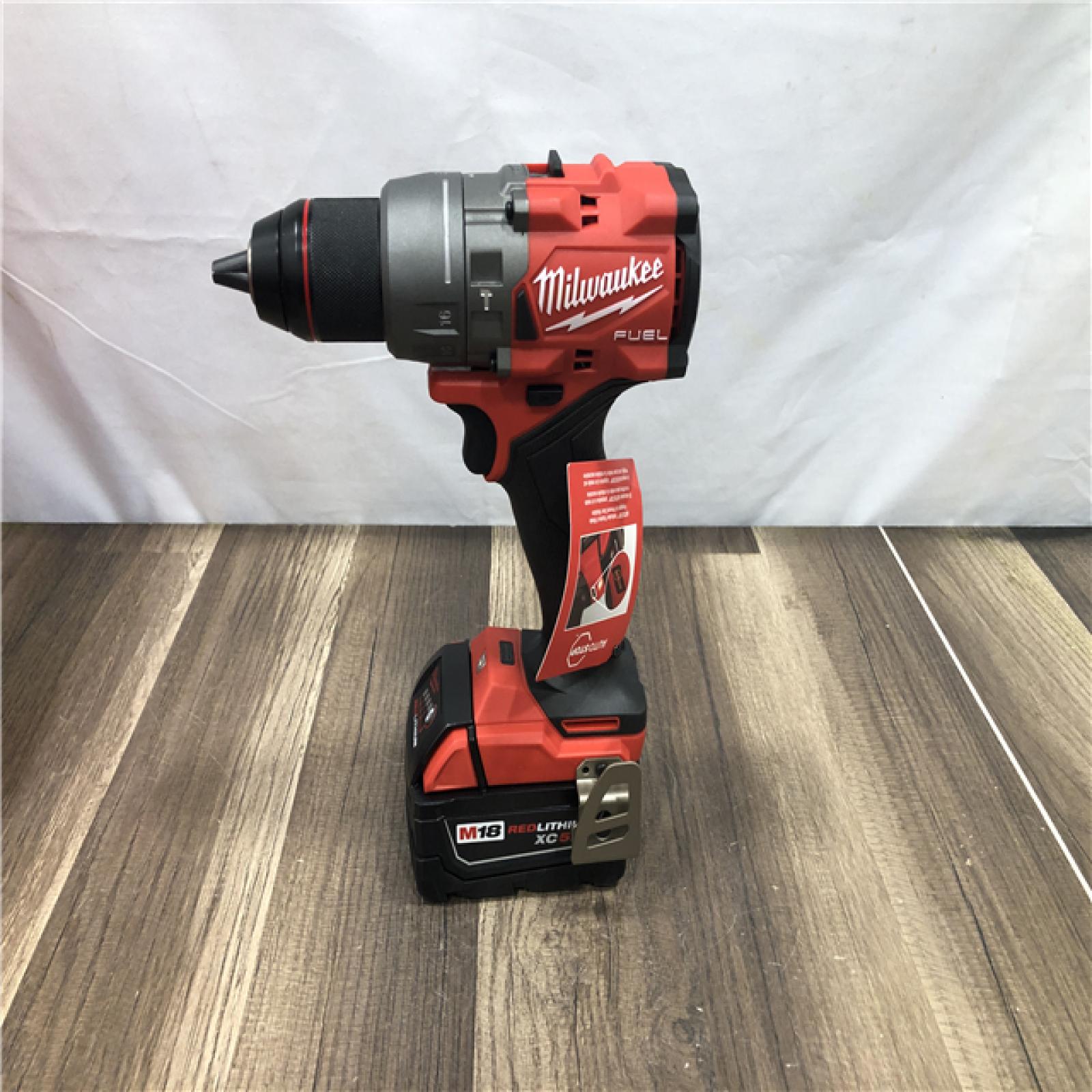 AS-IS Milwaukee FUEL 18V Lithium-Ion Brushless Cordless 1/2 in. Hammer Drill Driver Kit