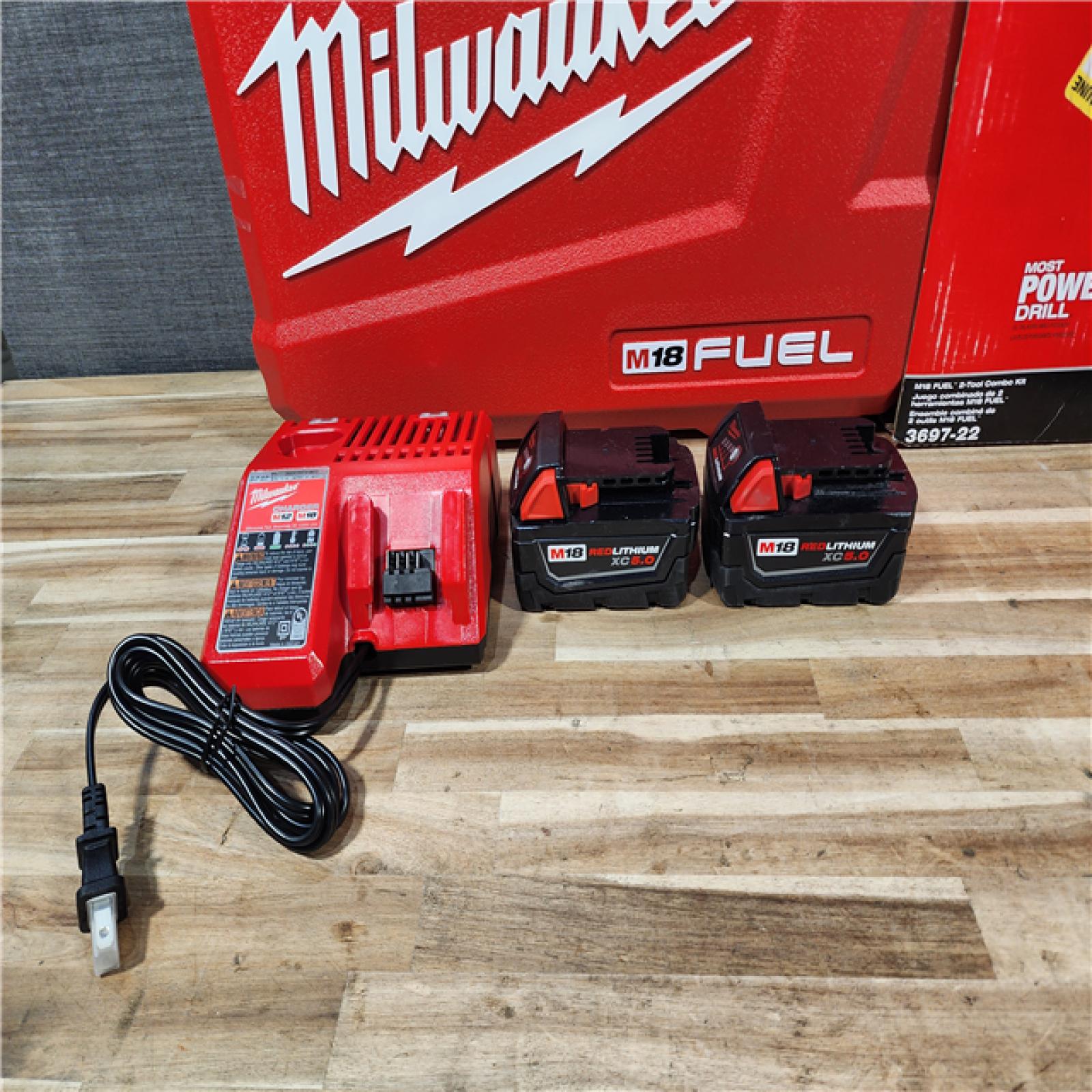 HOUSTON LOCATION - AS-IS (APPEARS LIKE NEW) Milwaukee  FUEL 18V Lithium-Ion Brushless Cordless Hammer Drill and Impact Driver Combo Kit