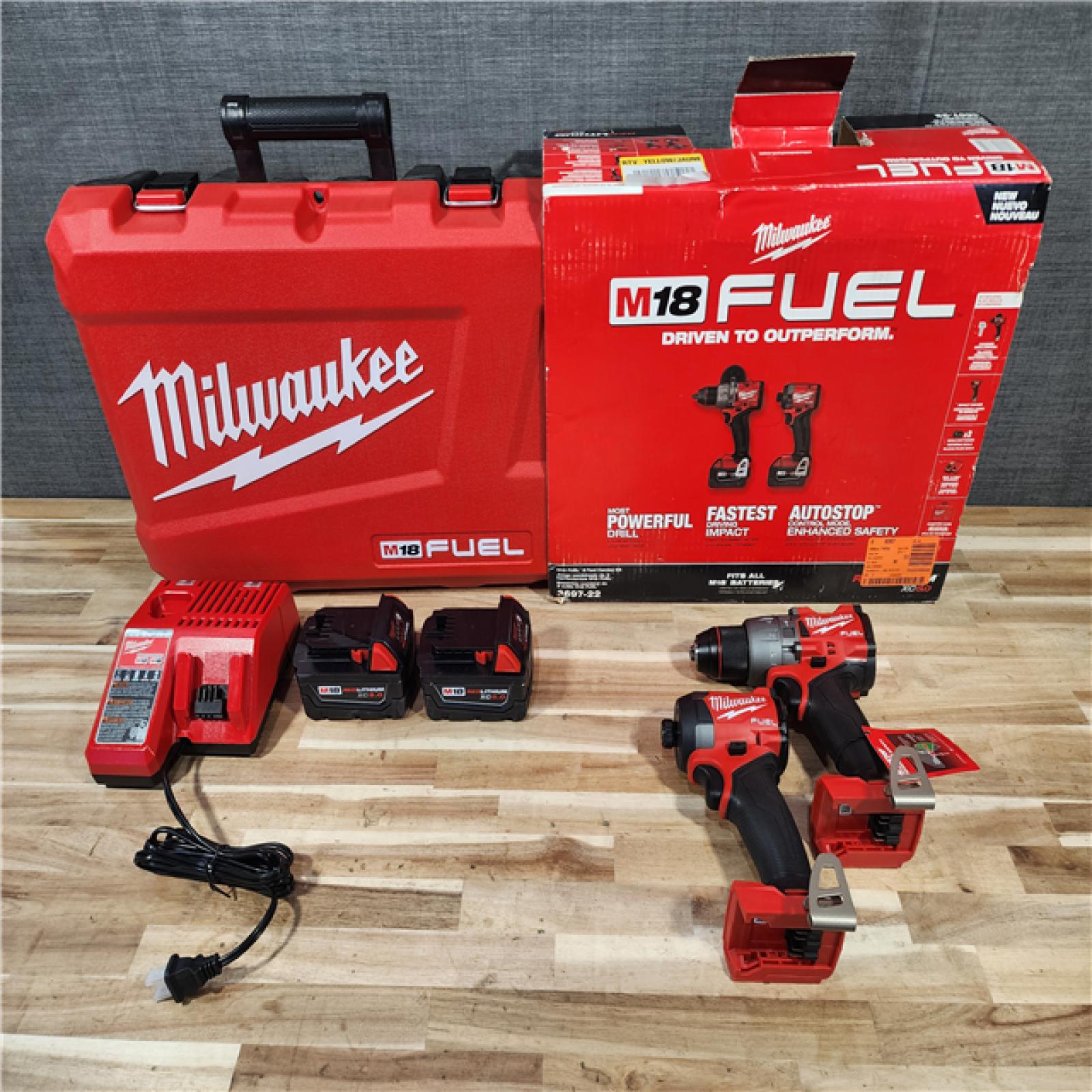 HOUSTON LOCATION - AS-IS (APPEARS LIKE NEW) Milwaukee  FUEL 18V Lithium-Ion Brushless Cordless Hammer Drill and Impact Driver Combo Kit