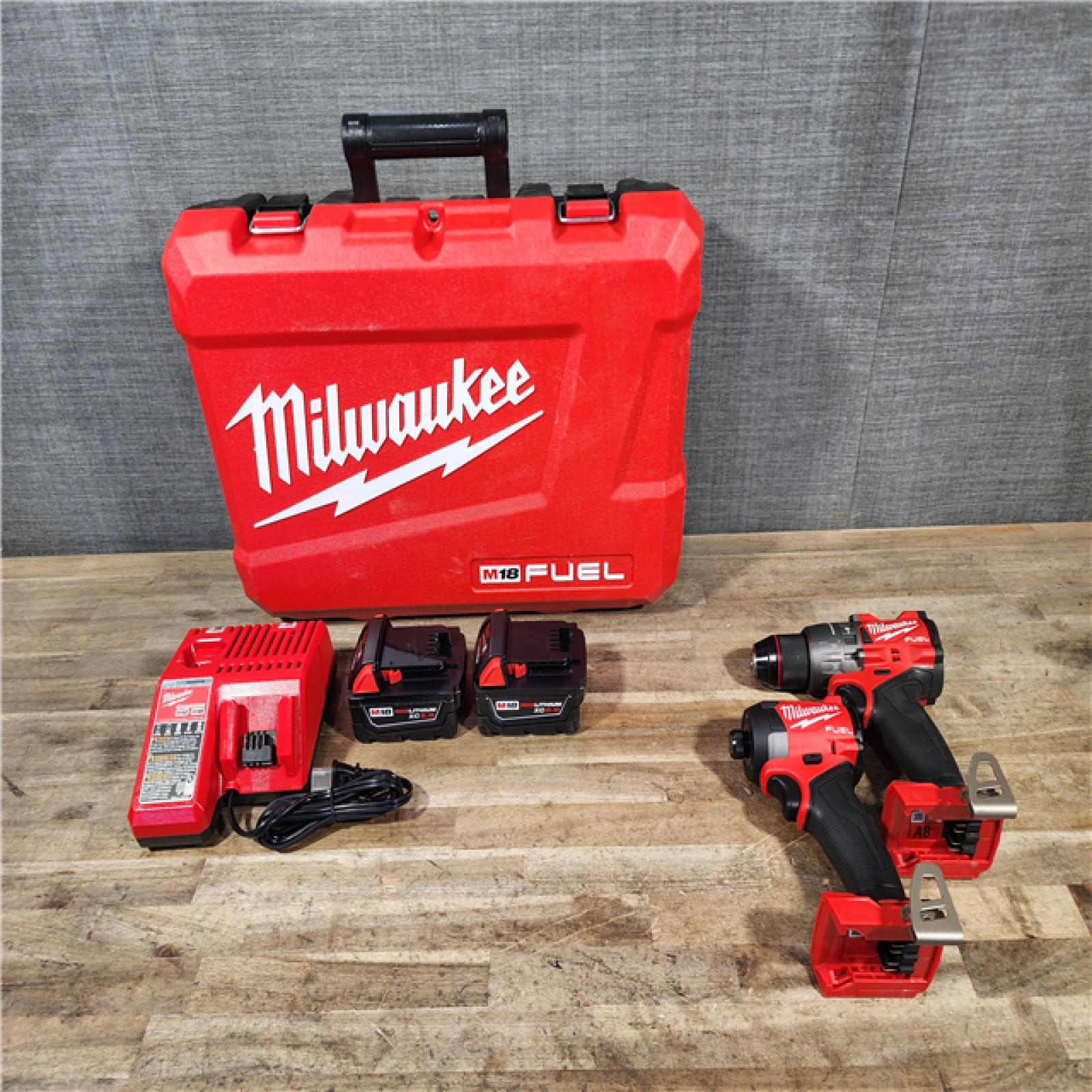 HOUSTON LOCATION - AS-IS Milwaukee FUEL 18V Lithium-Ion Brushless Cordless Hammer Drill and Impact Driver Combo Kit