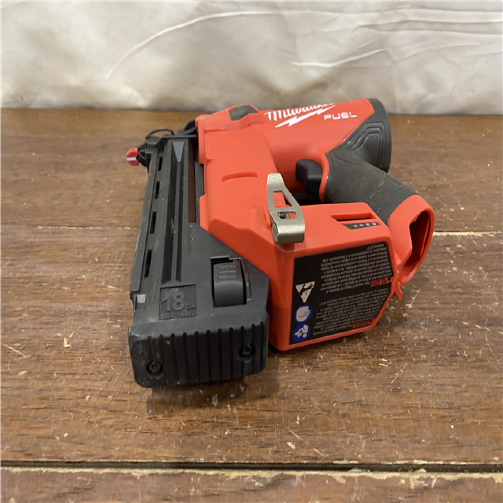 AS-IS M12 FUEL 12-Volt Lithium-Ion Brushless Cordless 18-Guage Compact Brad Nailer (Tool Only)