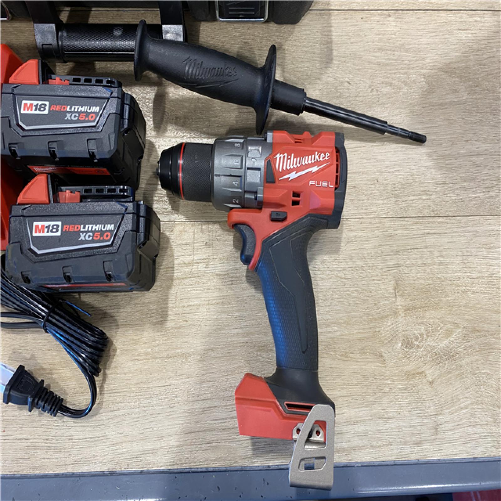 AS-IS Milwaukee FUEL 18V Lithium-Ion Brushless Cordless 1/2 in. Hammer Drill Driver Kit