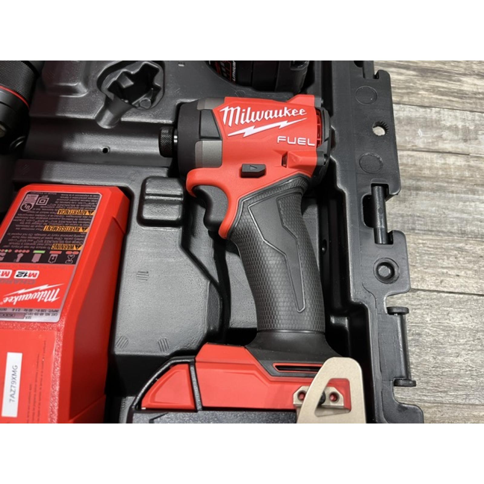 AS-IS Milwaukee FUEL 18V Lithium-Ion Brushless Cordless Hammer Drill and Impact Driver Combo Kit