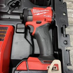 AS-IS Milwaukee FUEL 18V Lithium-Ion Brushless Cordless Hammer Drill and Impact Driver Combo Kit