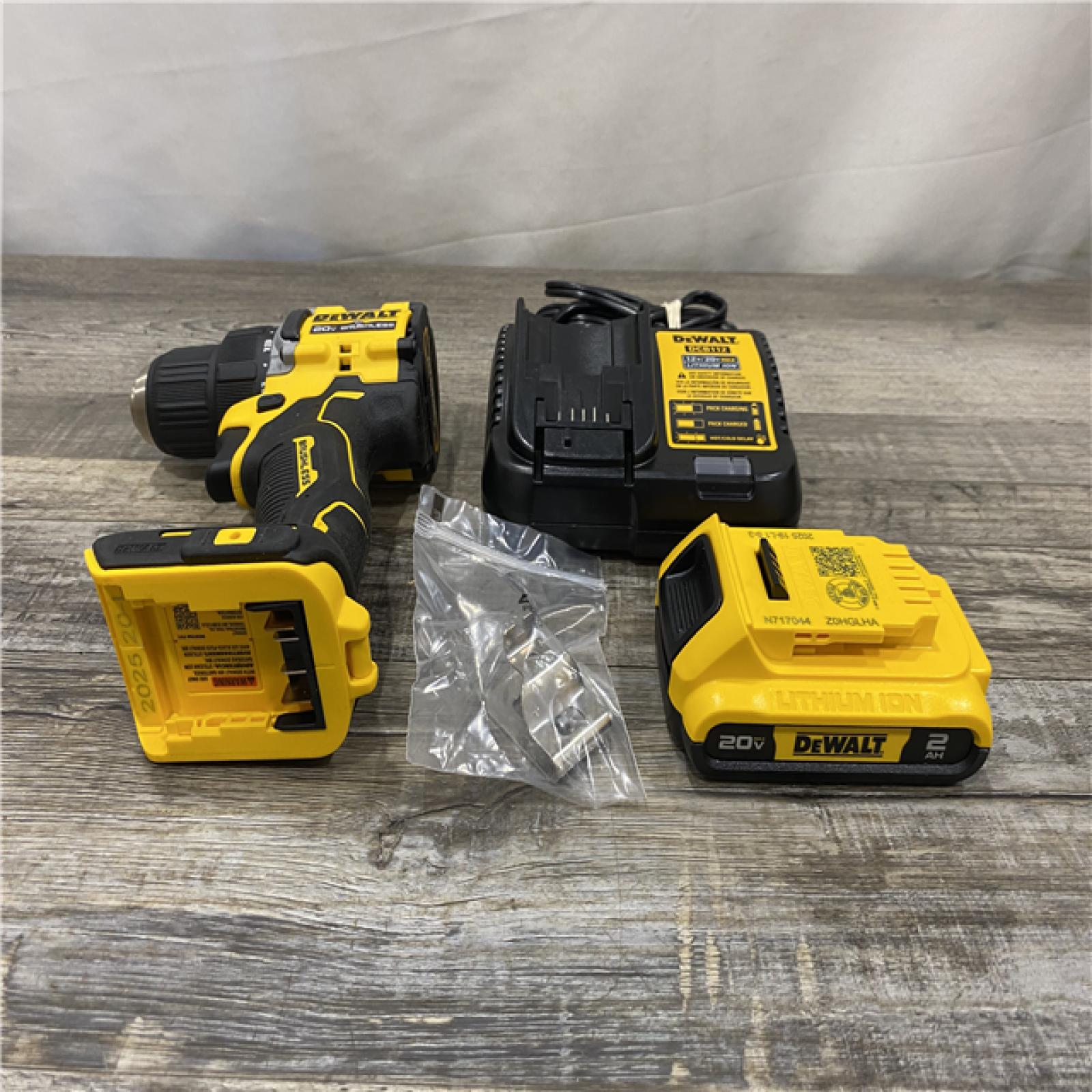 AS-IS DEWALT Atomic 20V Lithium-Ion Cordless Compact 1/2 in. Drill/Driver Kit
