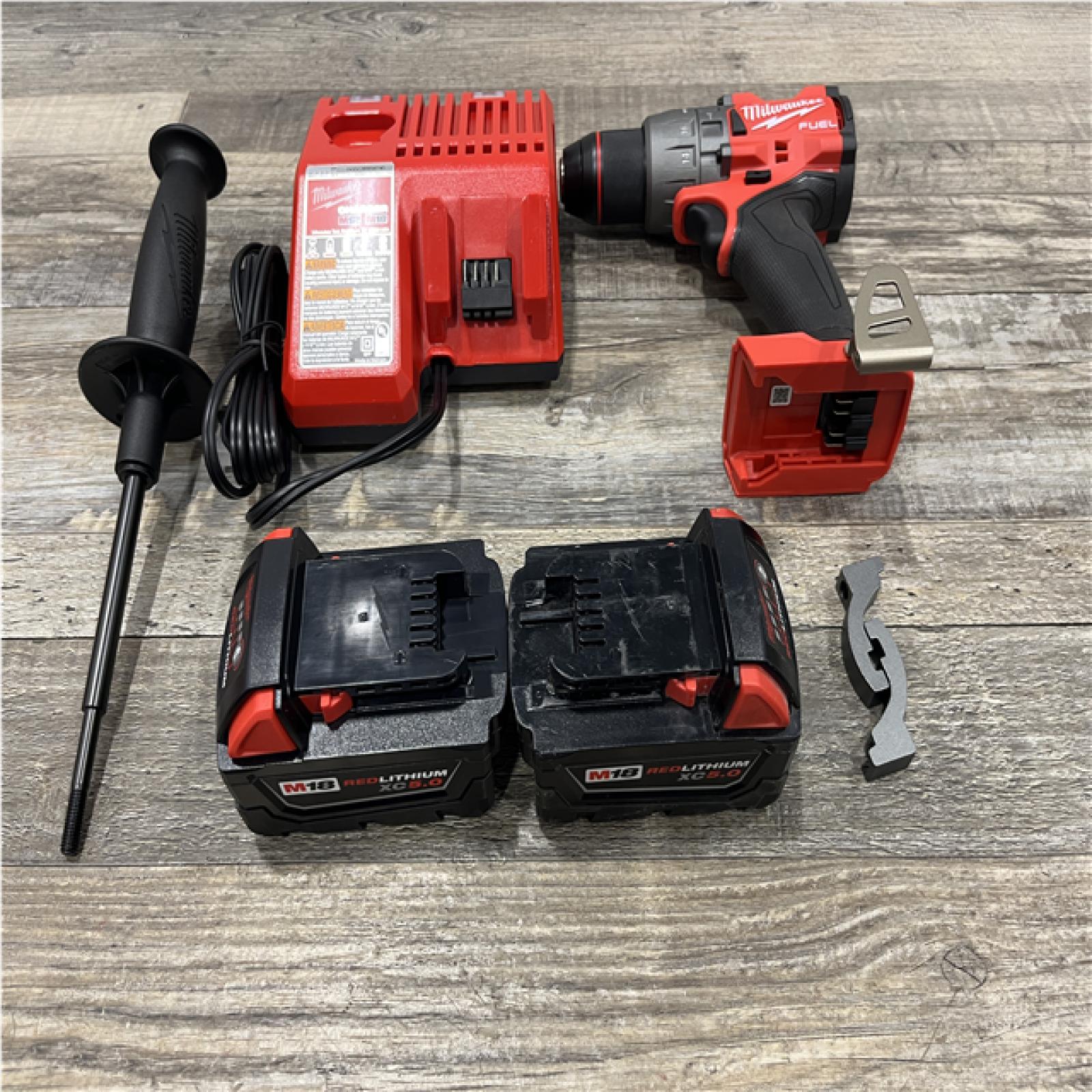 AS-IS Milwaukee FUEL 18V Lithium-Ion Brushless Cordless 1/2 in. Hammer Drill Driver Kit