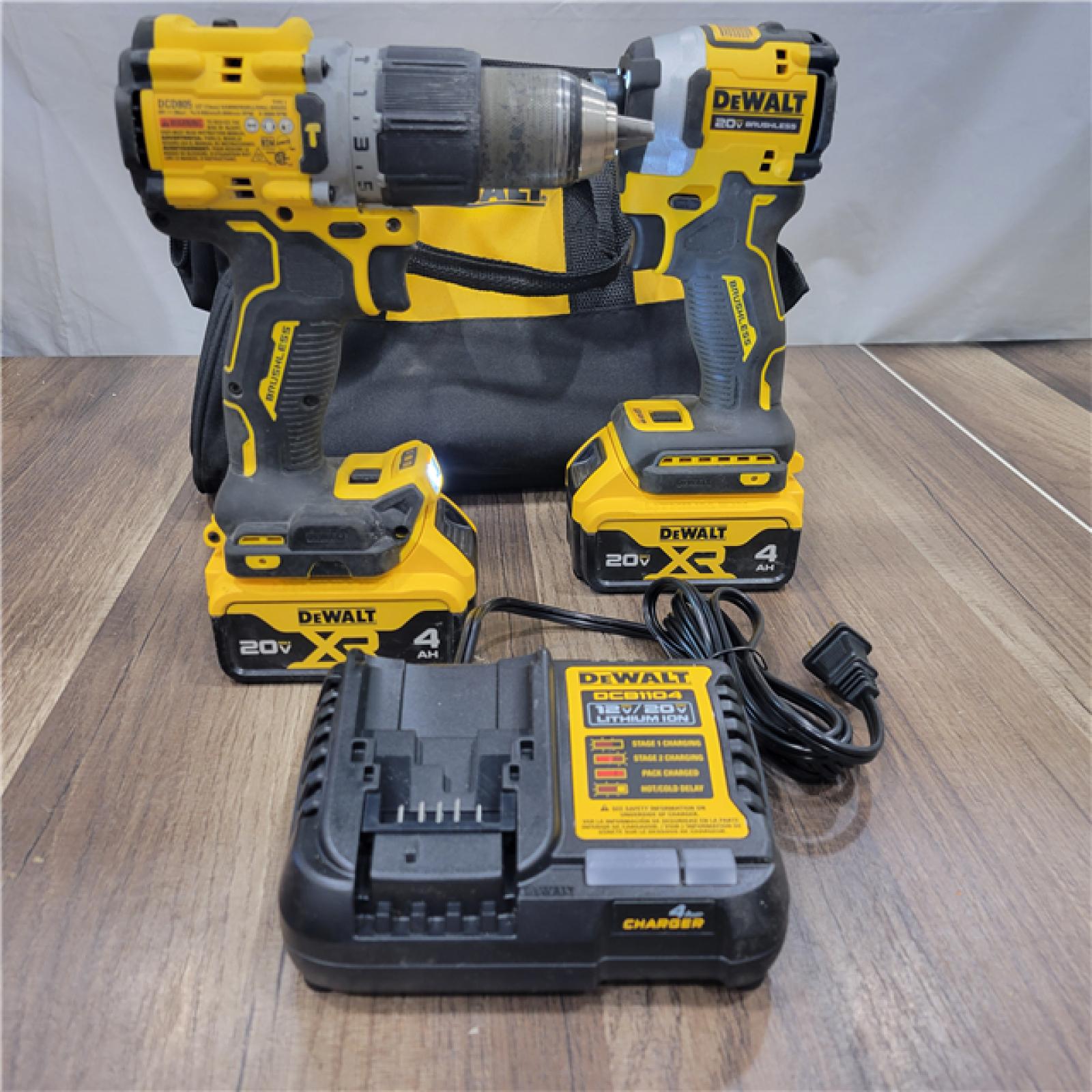 AS-IS DEWALT 20V MAX XR Hammer Drill and ATOMIC Impact Driver 2 Tool Cordless Combo Kit with (2) 4.0Ah Batteries, Charger, and Bag