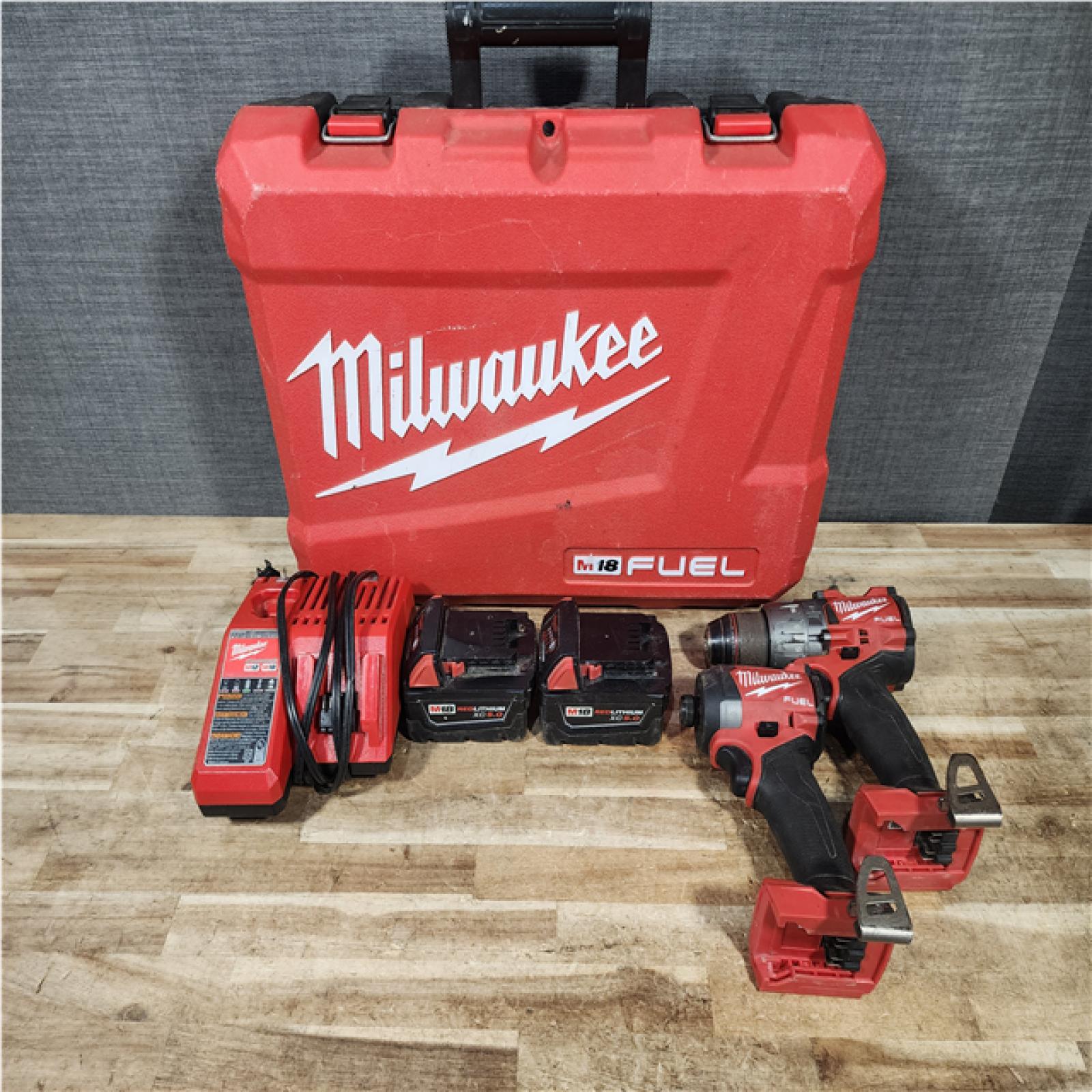 HOUSTON LOCATION - AS - IS Milwaukee FUEL 18V Lithium-Ion Brushless Cordless Hammer Drill and Impact Driver Combo Kit