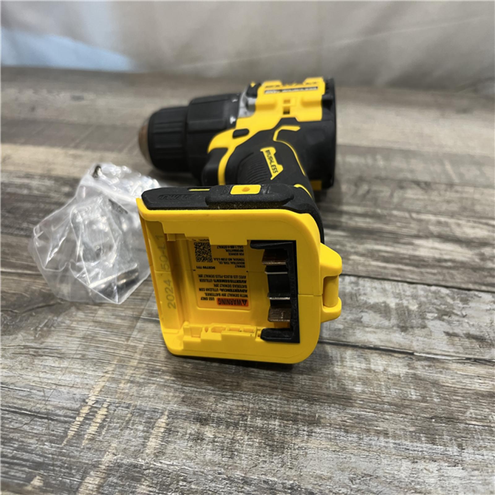 AS-IS DEWALT ATOMIC 20-Volt MAX Brushless Cordless 1/2 in. Hammer Drill (Tool-Only)