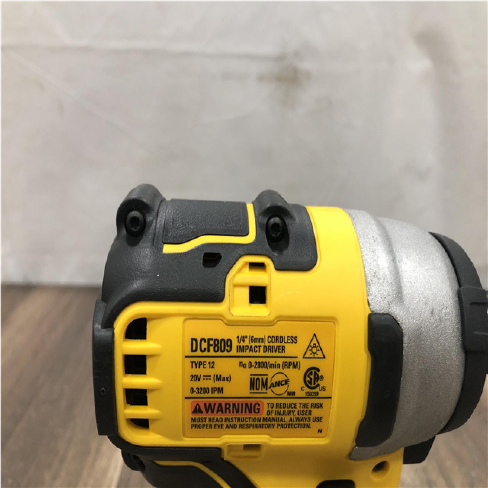 AS-IS DEWALT ATOMIC 20V MAX Cordless Brushless Compact 1/4 in. Impact Driver (Tool Only)