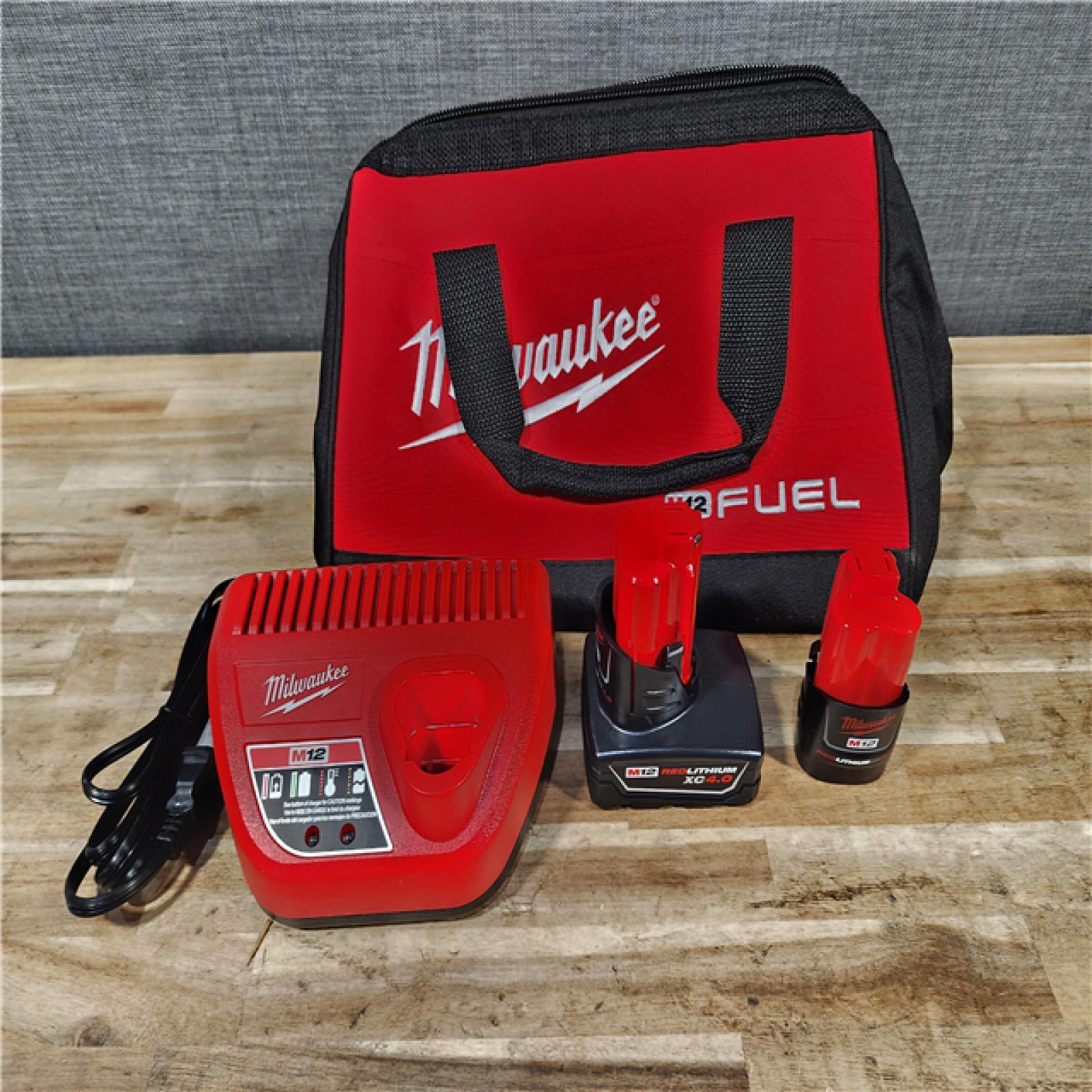 HOUSTON LOCATION - AS-IS (APPEARS LIKE NEW) Milwaukee FUEL 12-Volt Lithium-Ion Brushless Cordless Hammer Drill and Impact Driver Combo Kit