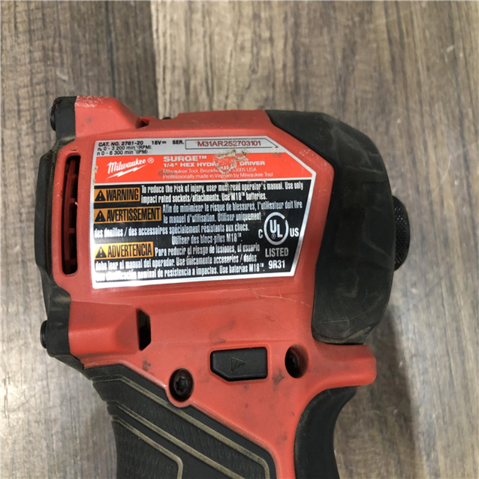 AS-IS Milwaukee FUEL SURGE 18V Lithium-Ion Brushless Cordless 1/4 in. Hex Impact Driver (Tool-Only)
