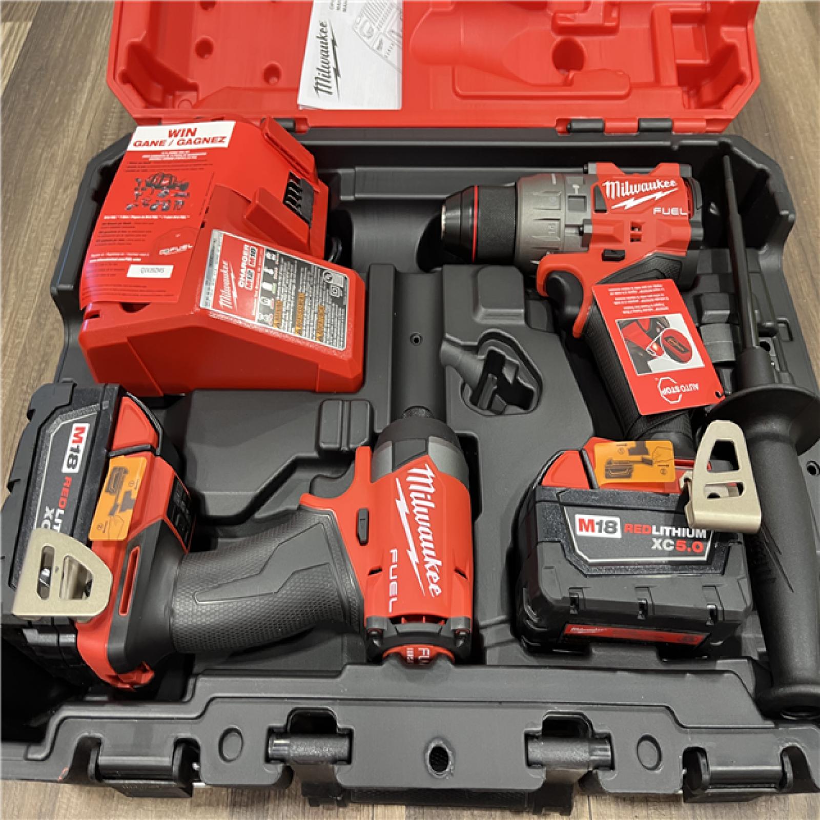 Like New! - MILWAUKEE FUEL 18V Lithium-Ion Brushless Cordless Hammer Drill and Impact Driver Combo Kit