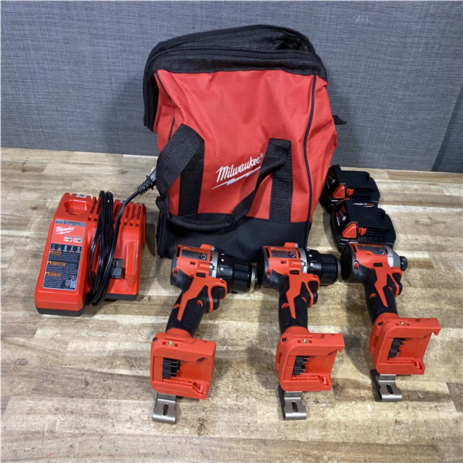 Houston Location AS-IS Milwaukee Drill Drivers QTY/2 and Impact Driver and Batteries QTY/2 with Charger