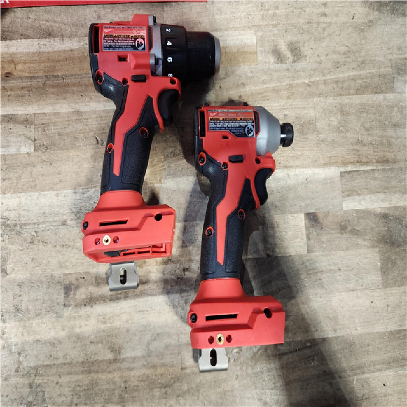 HOUSTON LOCATION - AS-IS Milwaukee M18 18V Lithium-Ion Brushless Cordless Compact Drill/Impact Combo Kit (2-Tool) W/(2) 2.0 Ah Batteries  Charger & Bag