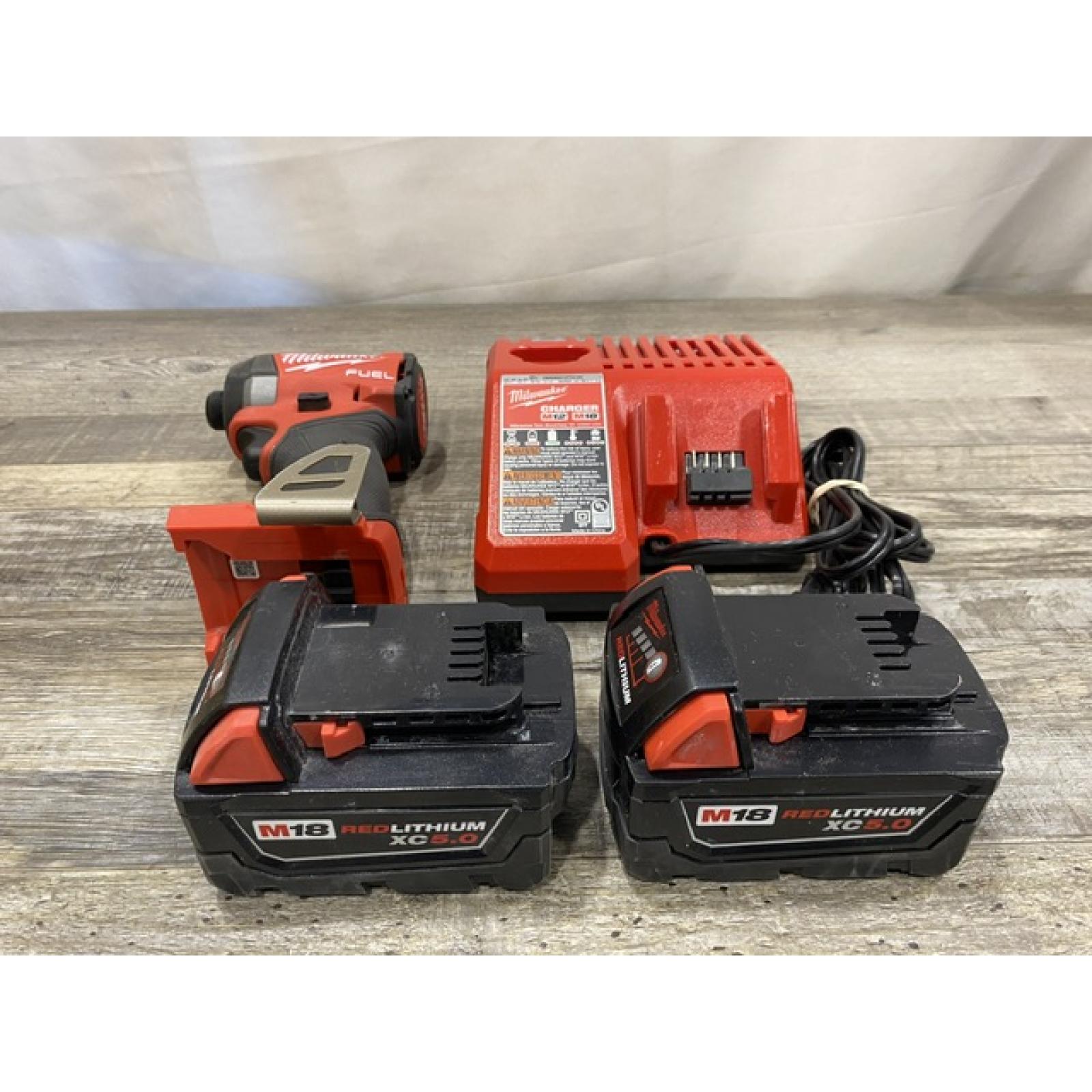 AS-IS Milwaukee FUEL 18V Lithium-Ion Brushless Cordless 1/4 in. Hex Impact Driver Kit