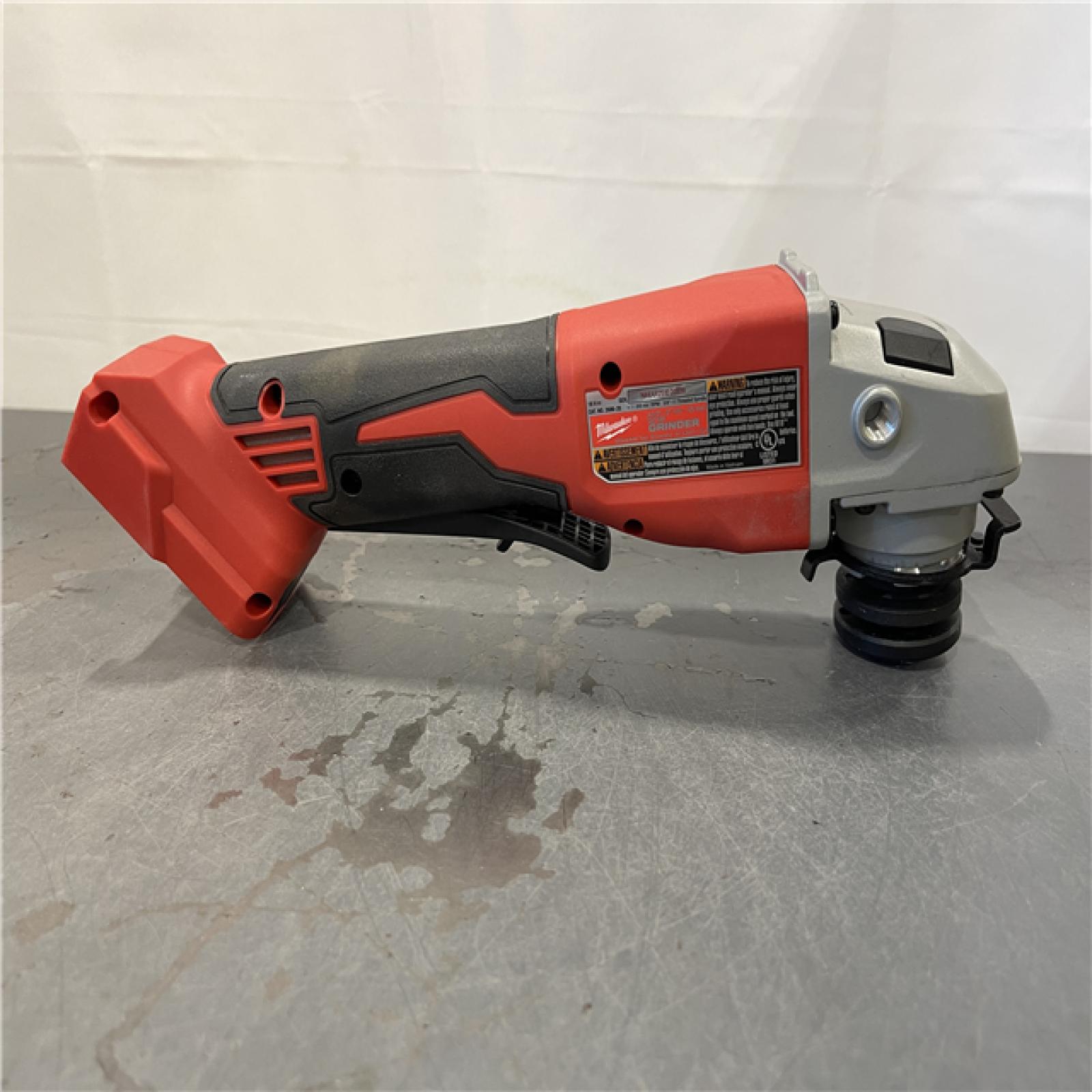 AS-IS - Milwaukee M18 18V Lithium-Ion Brushless Cordless 4-1/2 in./5 in. Grinder w/Paddle Switch