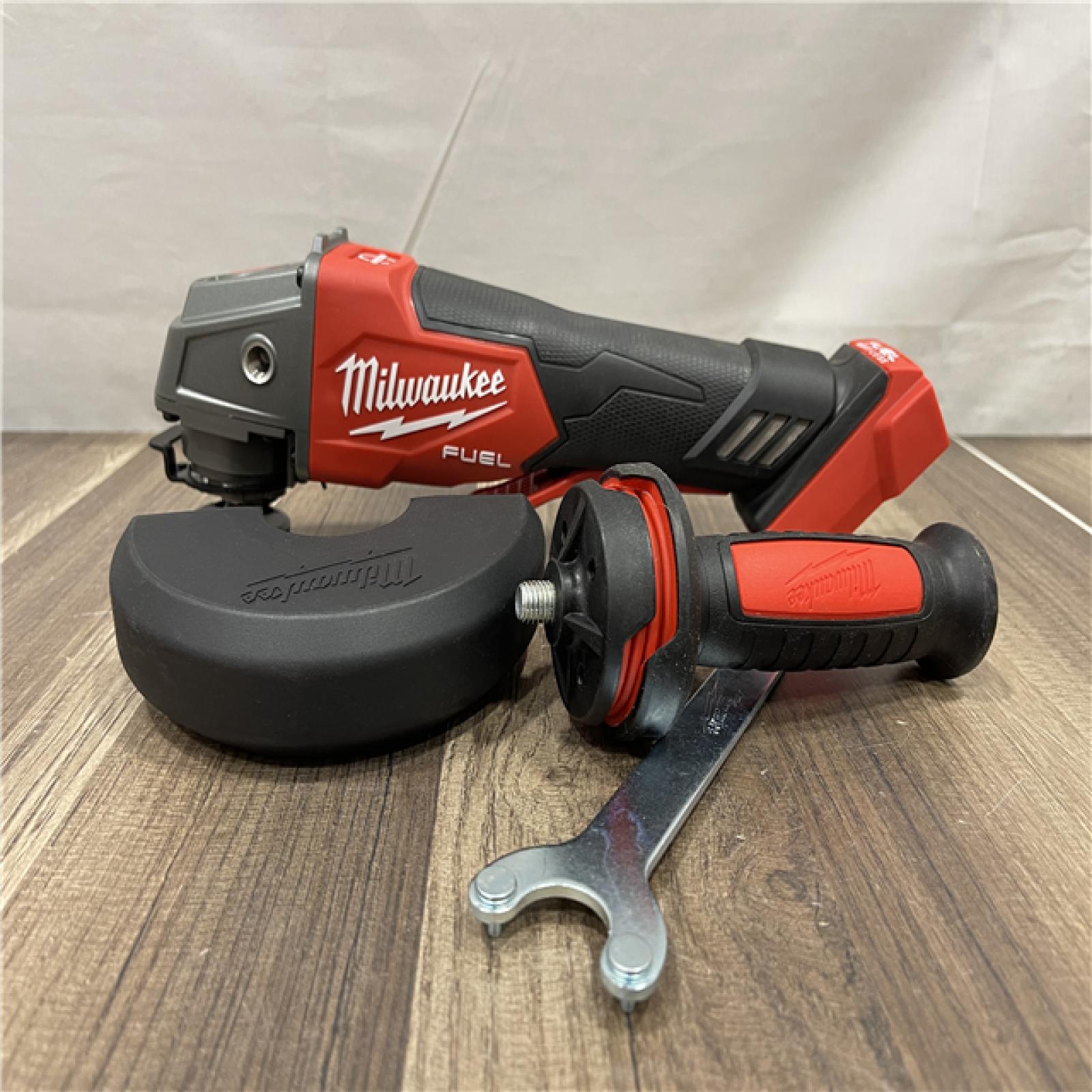 AS-IS Milwaukee FUEL 18V Lithium-Ion Brushless Cordless 4-1/2 in./5 in. Grinder w/Paddle Switch (Tool-Only)