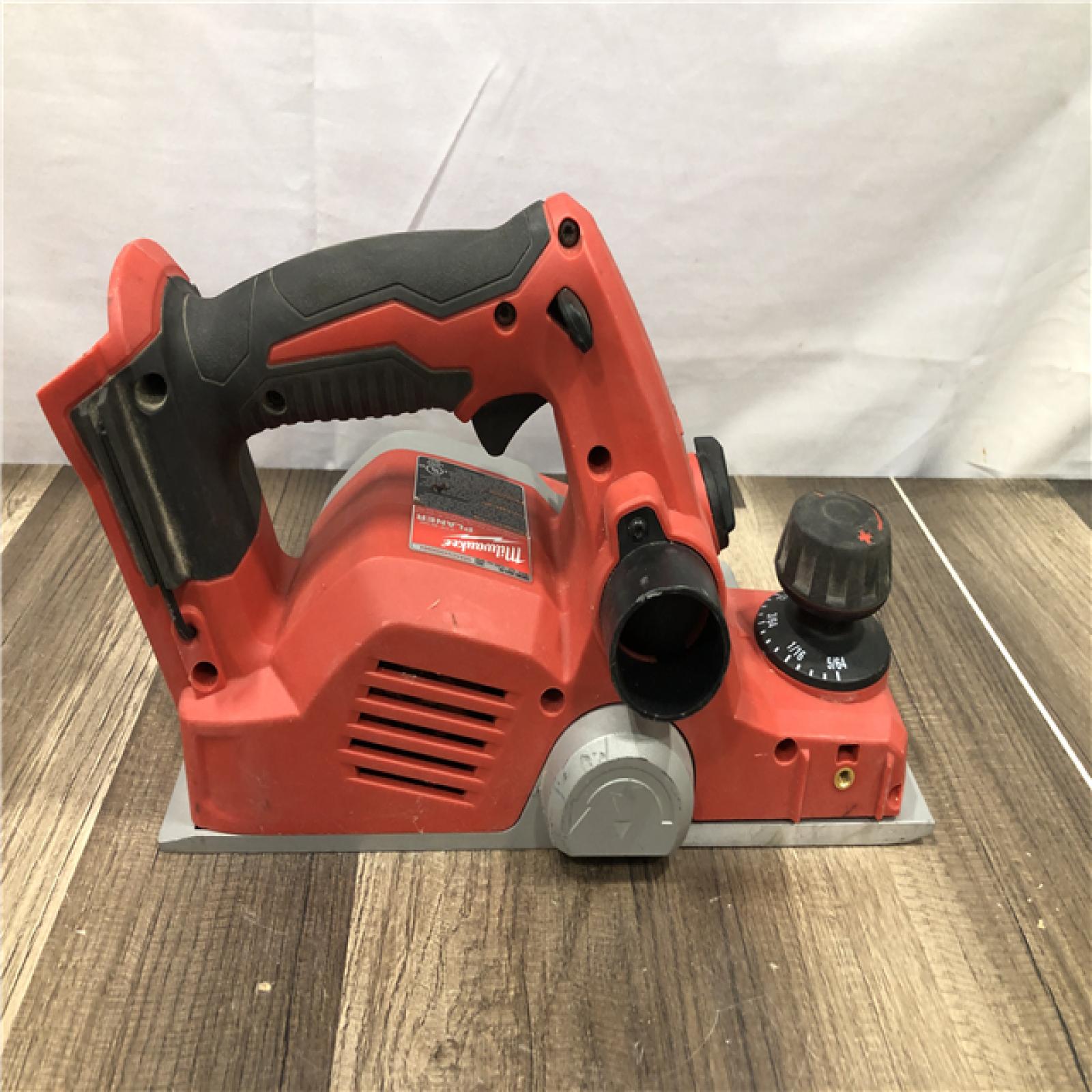 AS-IS Milwaukee M18 18V Lithium-Ion Cordless 3-1/4 in. Planer (Tool-Only)