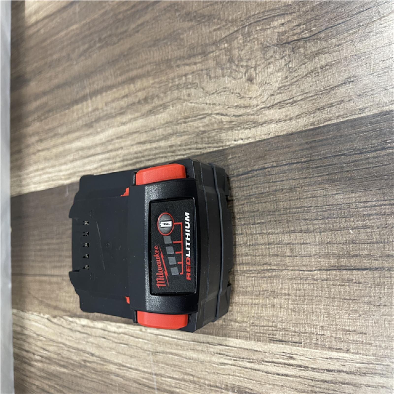 AS-IS Milwaukee 18-Volt Lithium-Ion XC Starter Kit with One 5.0Ah Battery and Charger