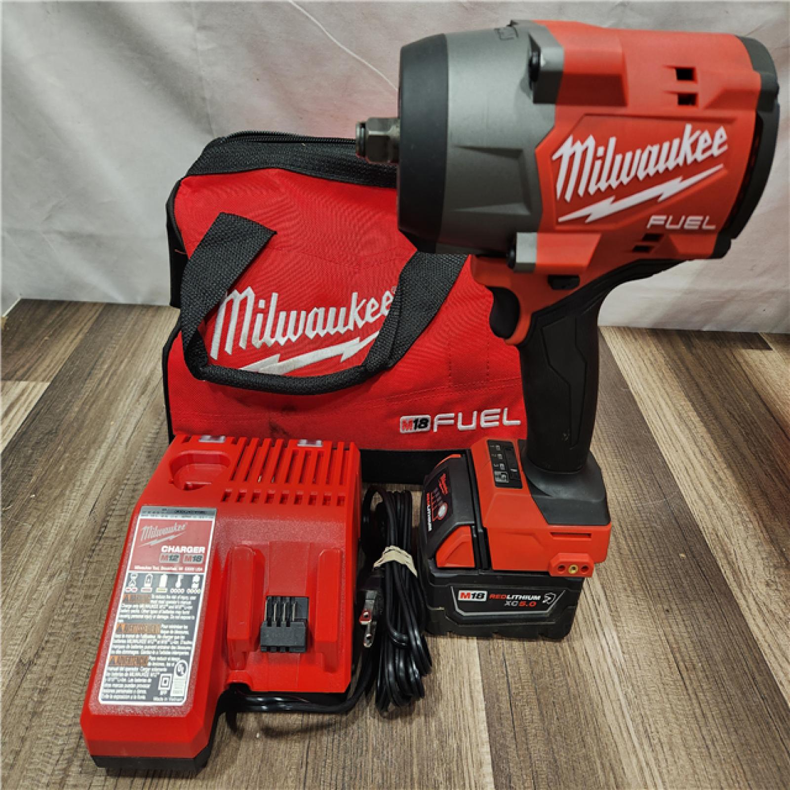 AS-IS- Milwaukee M18 1/2 in. Cordless Brushless High Torque Impact Wrench Kit (Battery & Charger)