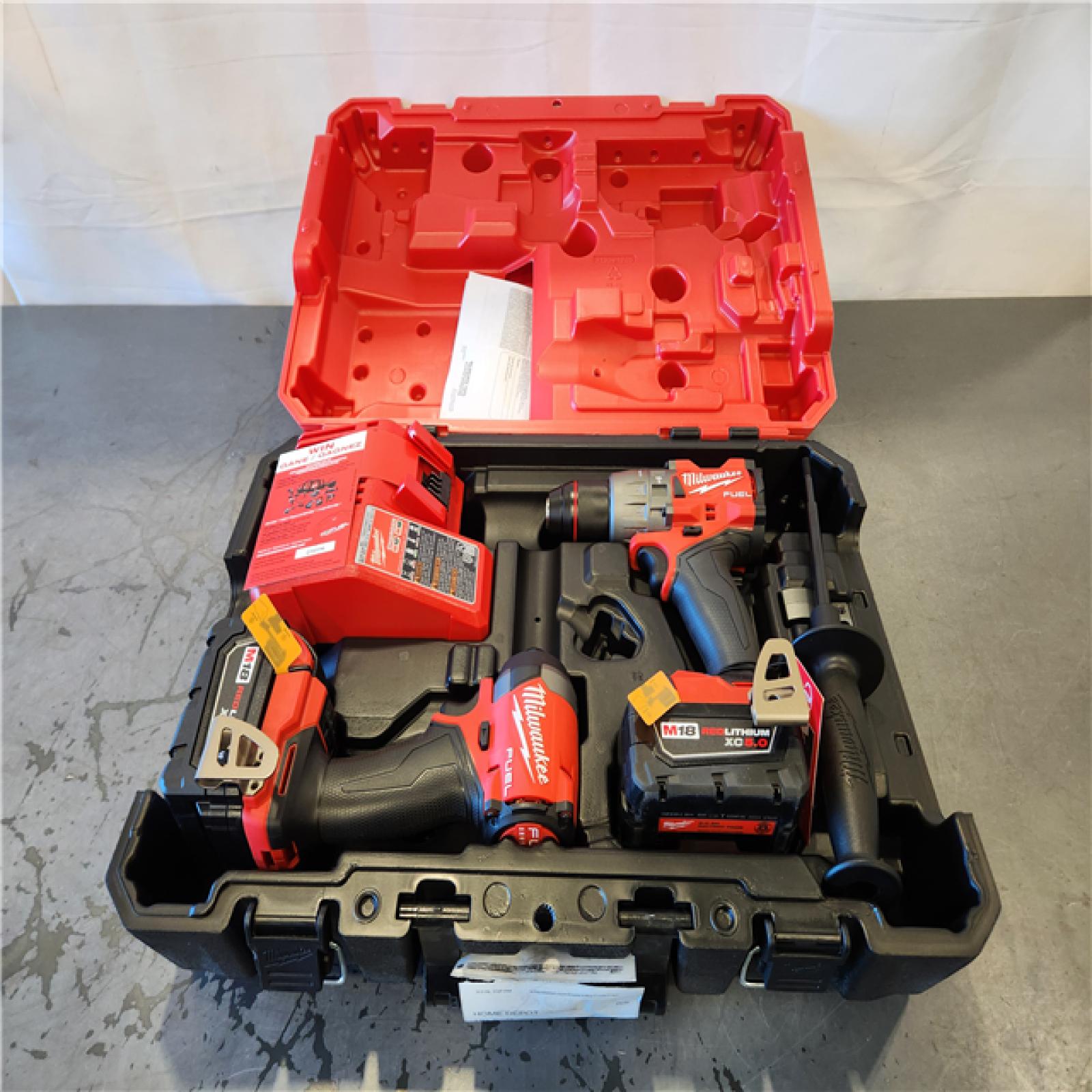 AS-IS- Milwaukee FUEL 18V Lithium-Ion Brushless Cordless Hammer Drill and Impact Driver Combo Kit