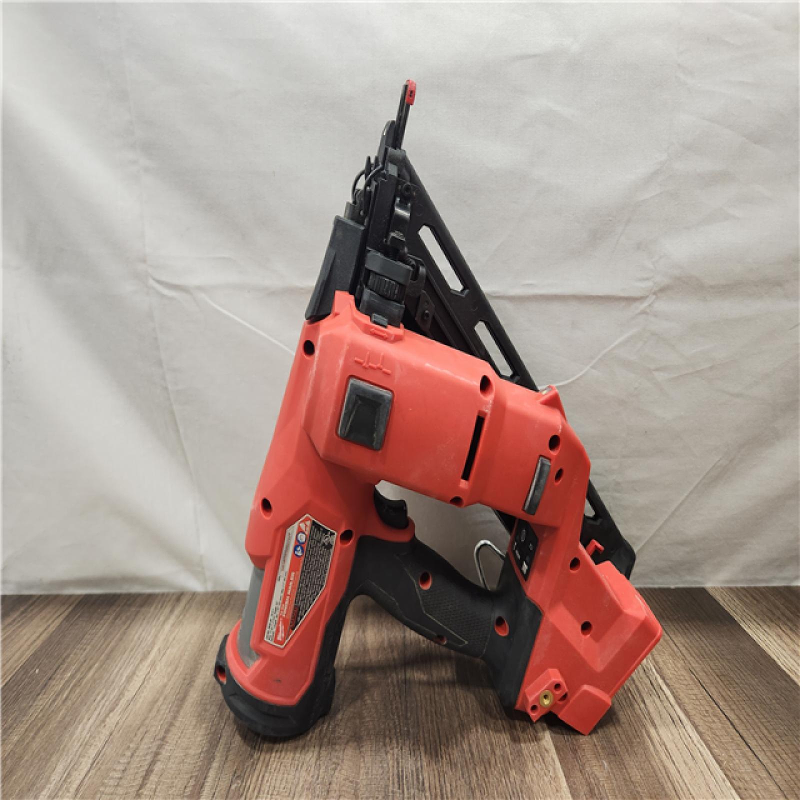 AS-IS- Milwaukee M18 FUEL 15 Ga. 18 Volt Brushless Angled Finish Nailer (TOOL ONLY)