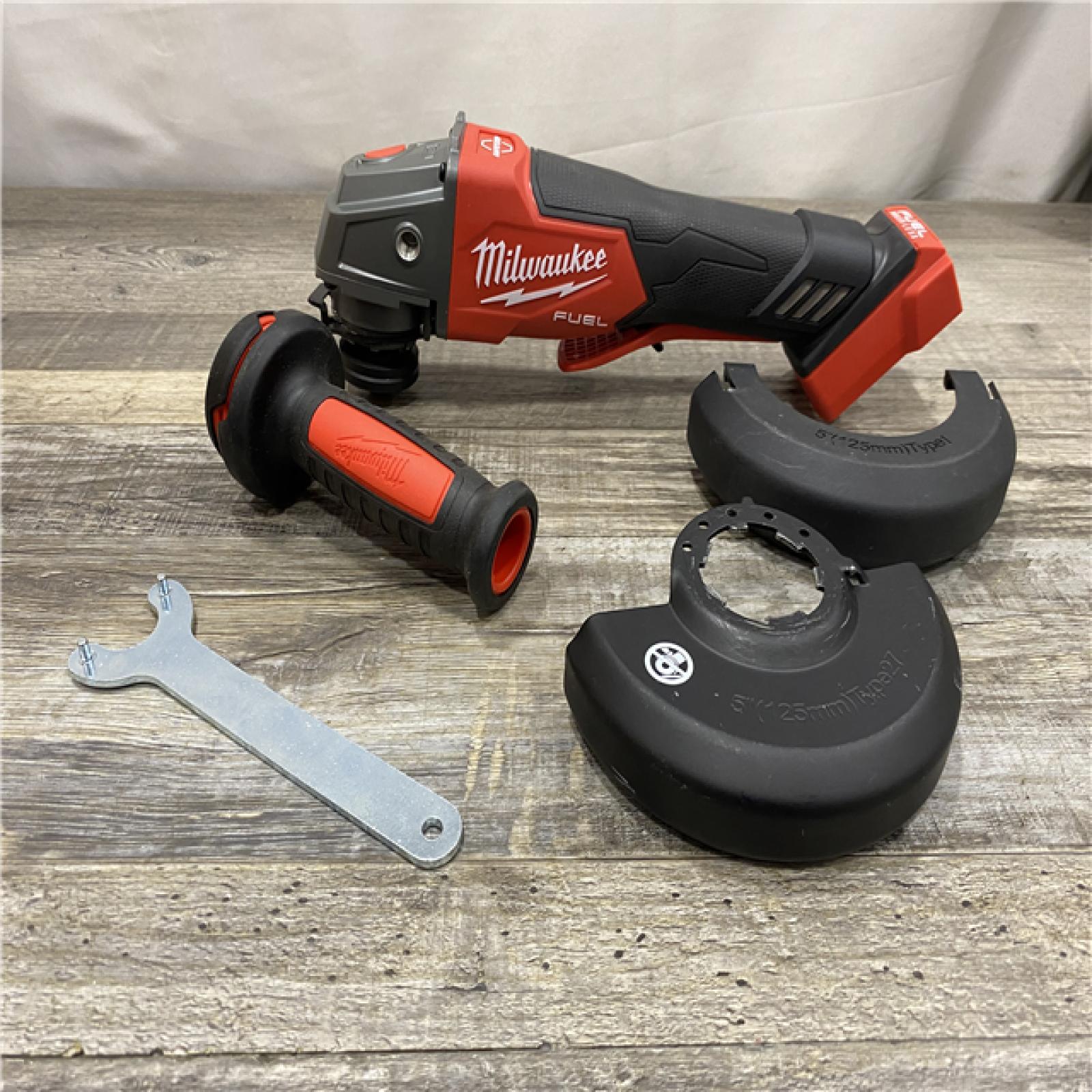 AS-IS Milwaukee  FUEL 18V Lithium-Ion Brushless Cordless 4-1/2 in./5 in. Grinder w/Paddle Switch (Tool-Only)