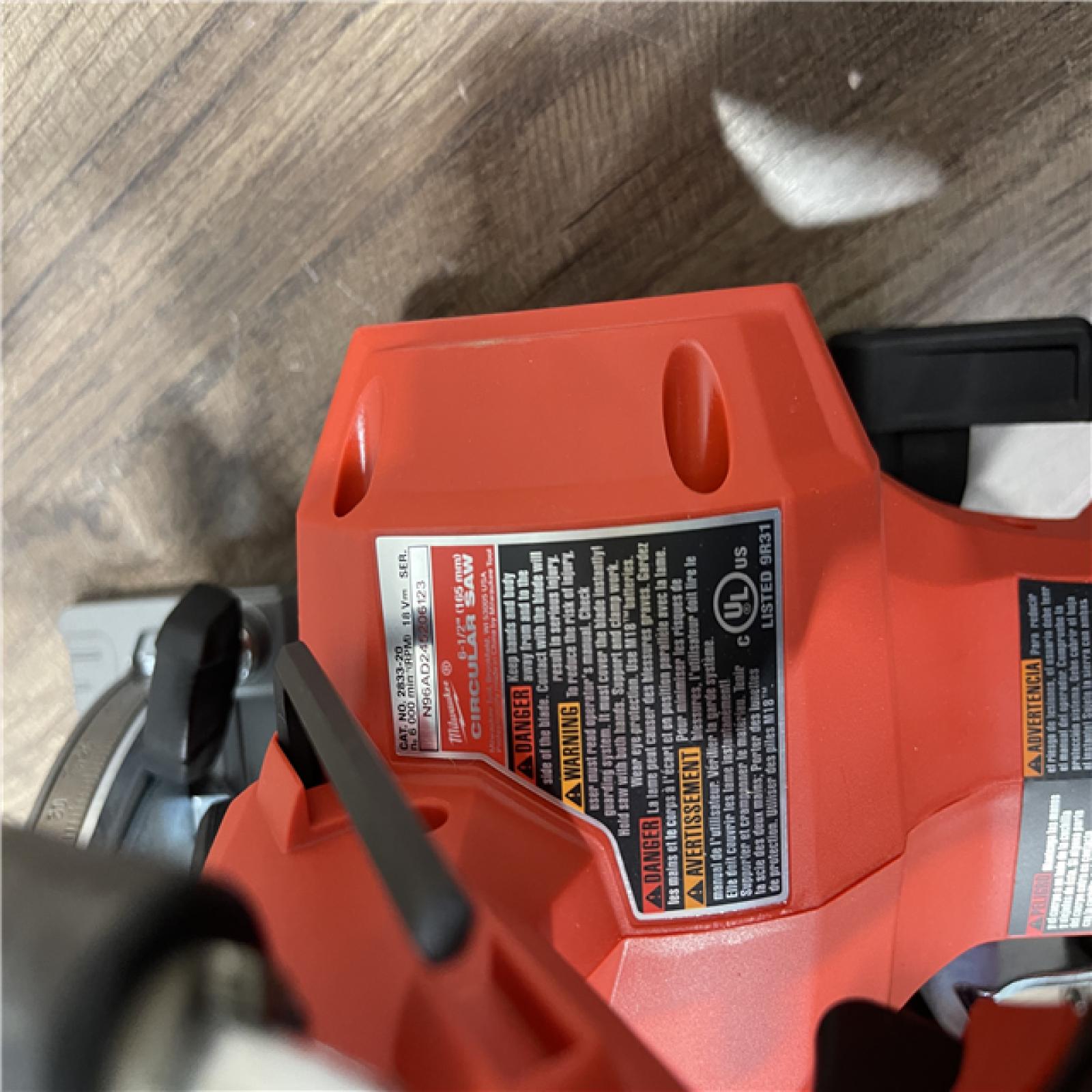 AS-IS Milwaukee FUEL 18V Lithium-Ion Brushless Cordless 6-1/2 in. Circular Saw (Tool-Only)