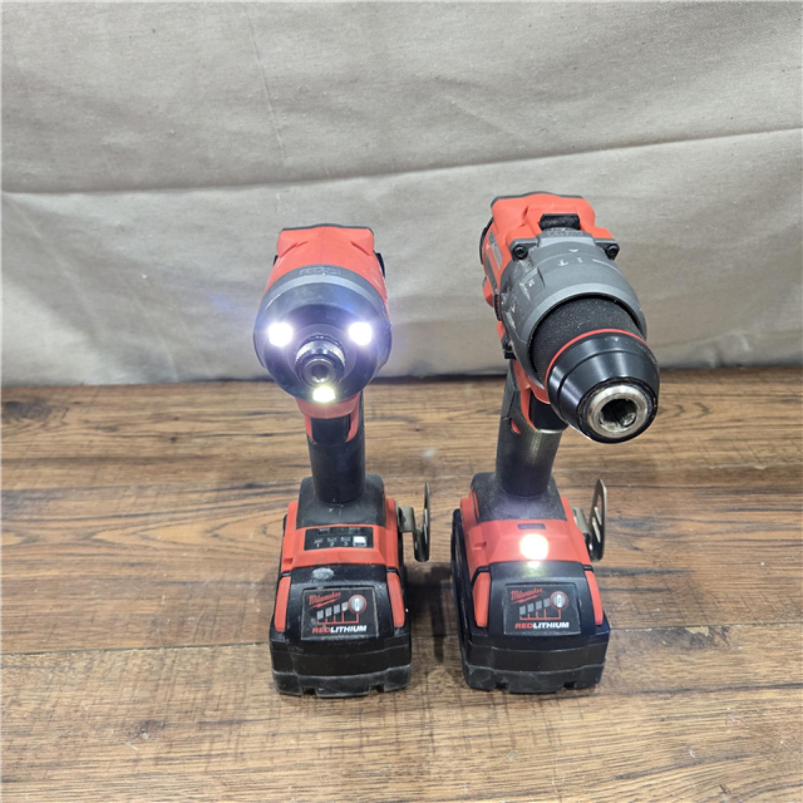AS-IS MILWAUKEE M18 FUEL 18V Lithium-Ion Brushless Cordless Hammer Drill and Impact Driver Combo Kit (2-Tool) with 2 Batteries