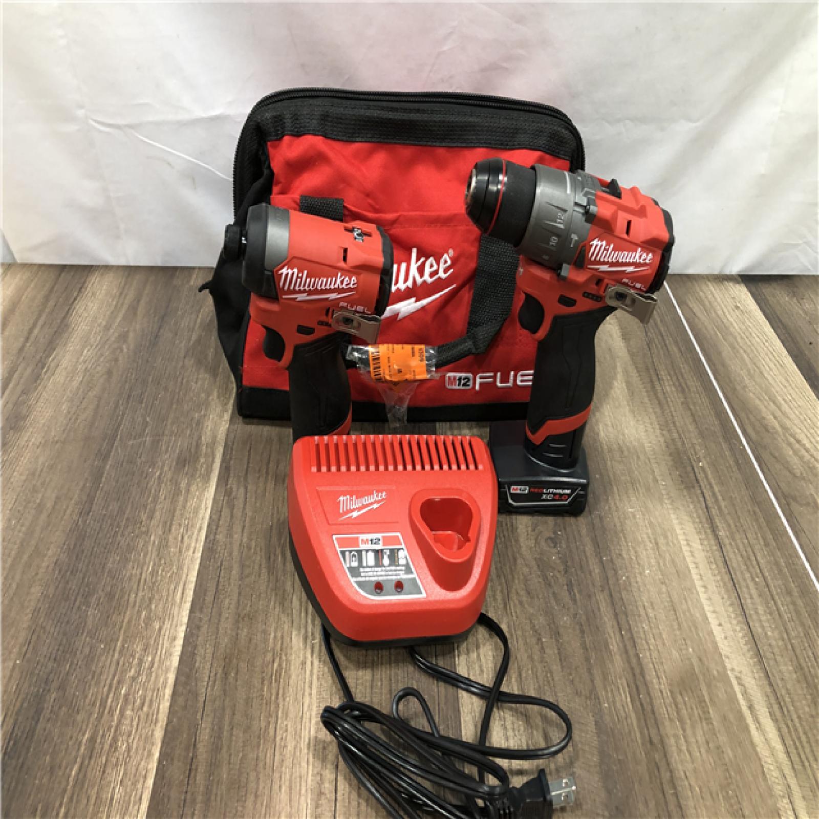 AS-IS Milwaukee FUEL 12-Volt Lithium-Ion Brushless Cordless Hammer Drill and Impact Driver Combo Kit