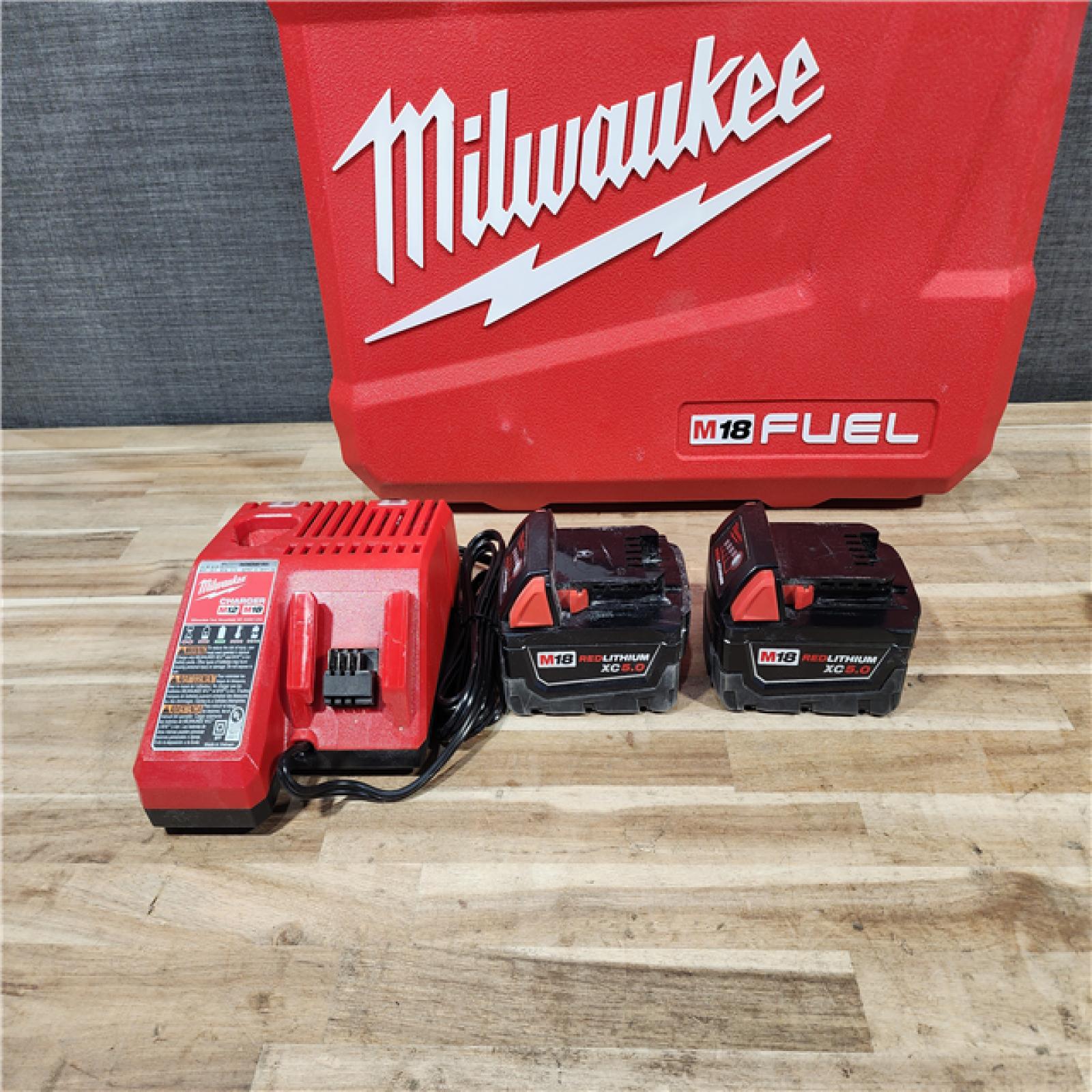 HOUSTON LOCATION - AS-IS Milwaukee FUEL 18V Lithium-Ion Brushless Cordless Hammer Drill and Impact Driver Combo Kit