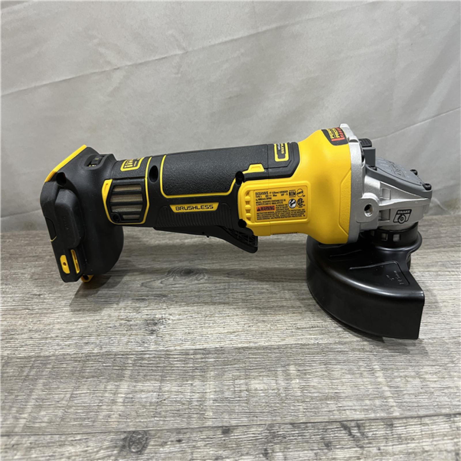 AS-IS DEWALT 20V XR Cordless 4-1/2. in. to 5 in. Variable Speed Angle Grinder (Tool Only)