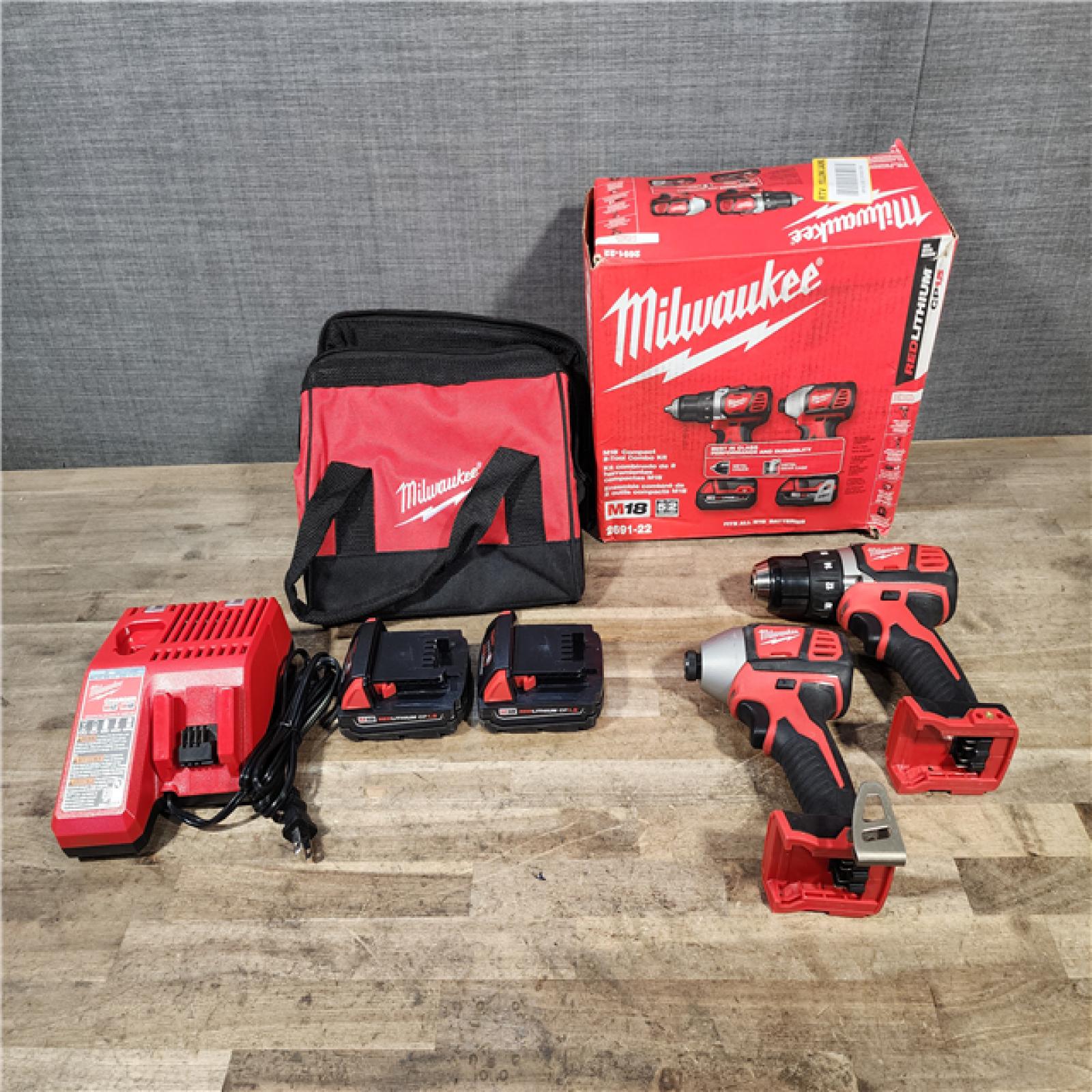 HOUSTON LOCATION - AS-IS Milwaukee M18 Brushed Cordless (2-Tool) Drill/Driver and Impact Driver Kit