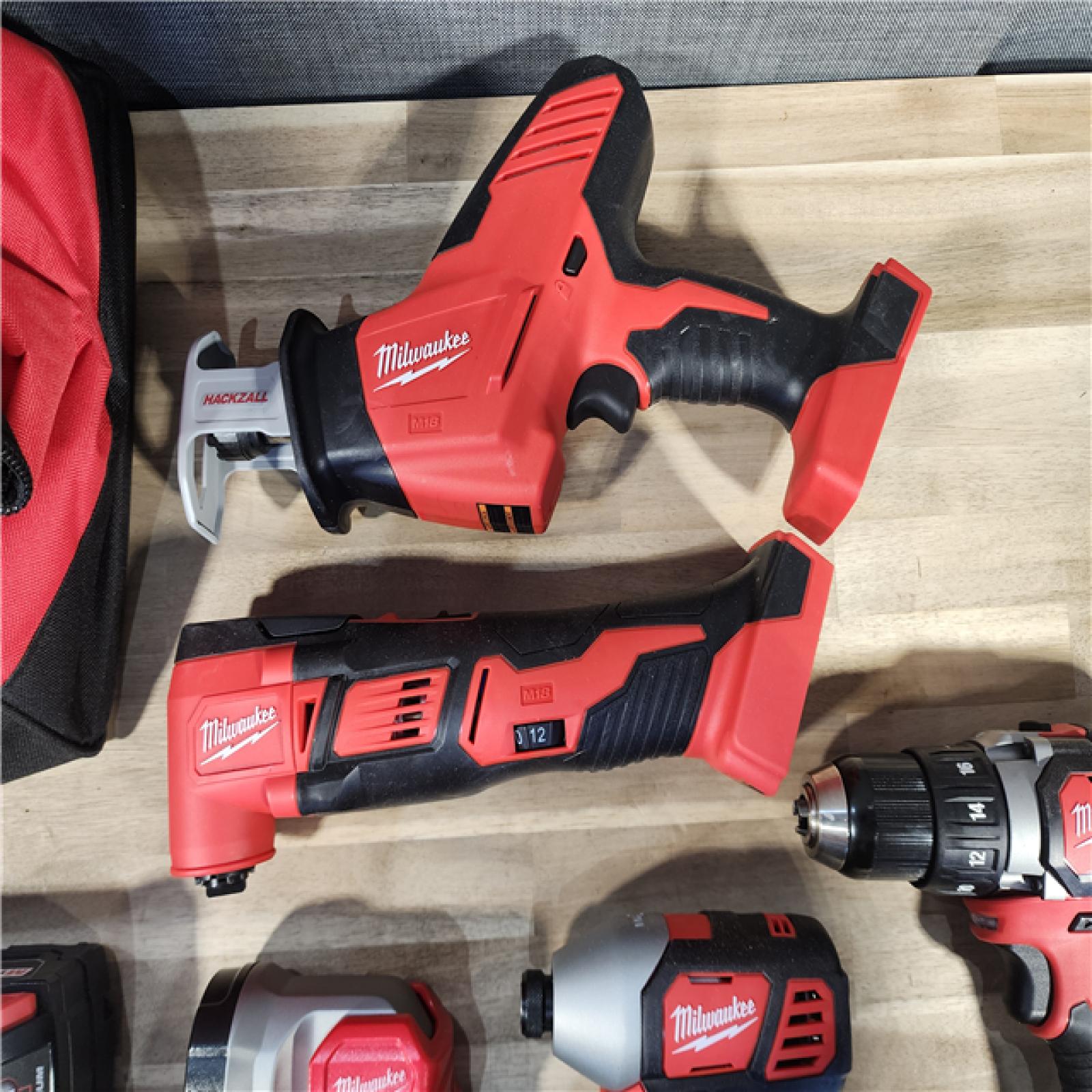 HOUSTON LOCATION - AS-IS M18 18V Lithium-Ion Cordless Combo Kit (5-Tool) with (2) Batteries, Charger and Tool Bag