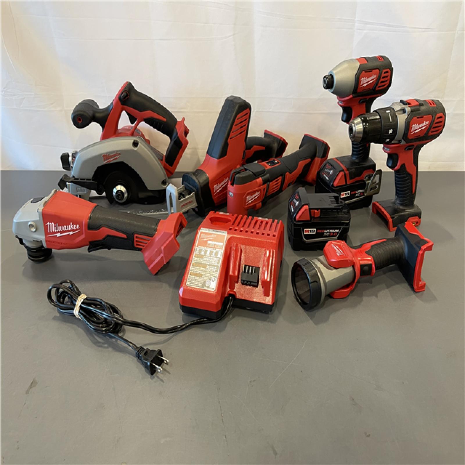 AS-IS - Milwaukee M18 18-Volt Lithium-Ion Cordless Combo Kit 7-Tool with 2-Batteries, Charger and Tool Bag