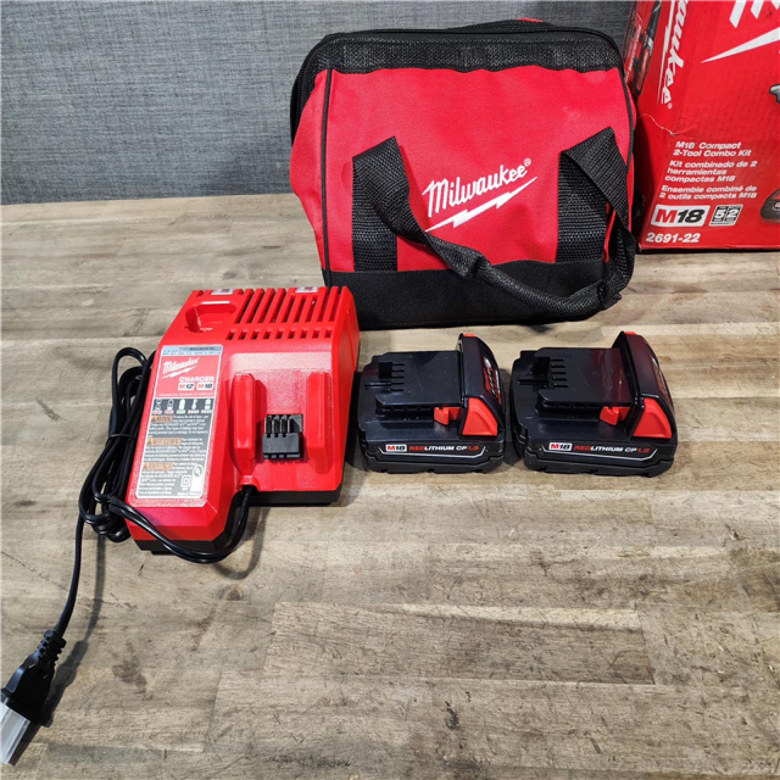 HOUSTON LOCATION - AS-IS Milwaukee 18V Cordless Brushed 2-Tool Drill/Driver and Impact Driver Kit