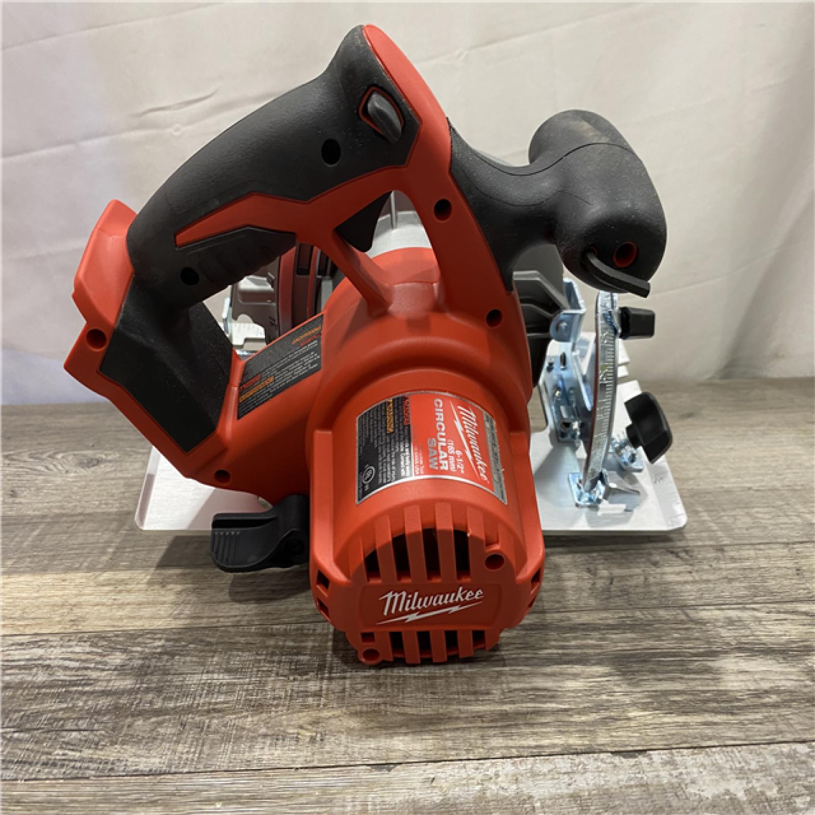 AS-IS Milwaukee 18V Lithium-Ion Cordless 6-1/2 in. Circular Saw (Tool-Only)