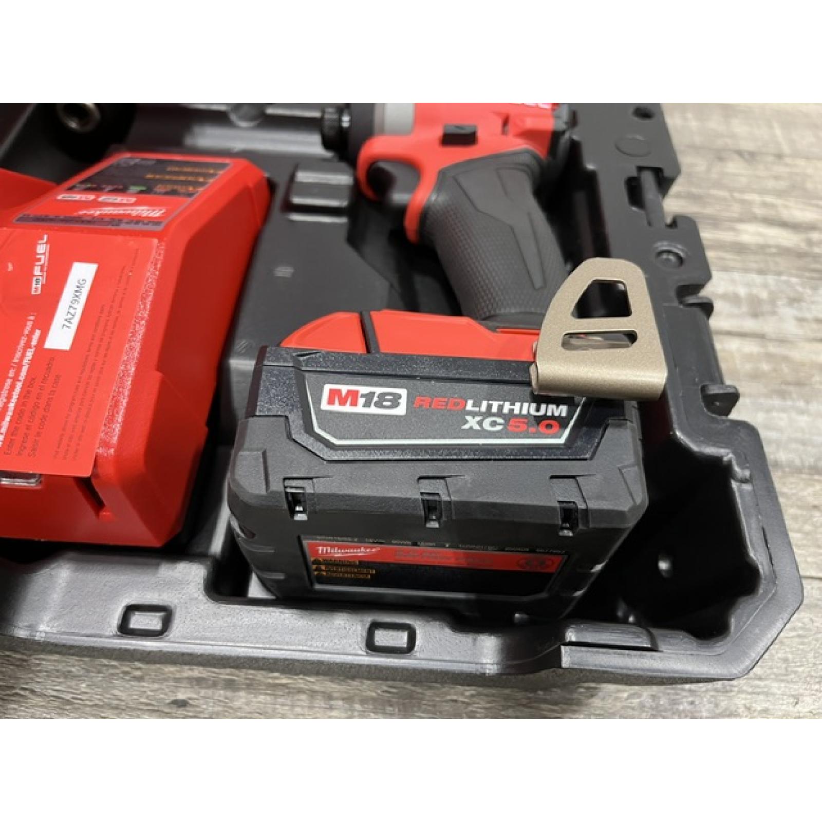 AS-IS Milwaukee FUEL 18V Lithium-Ion Brushless Cordless Hammer Drill and Impact Driver Combo Kit