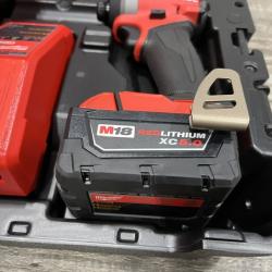 AS-IS Milwaukee FUEL 18V Lithium-Ion Brushless Cordless Hammer Drill and Impact Driver Combo Kit