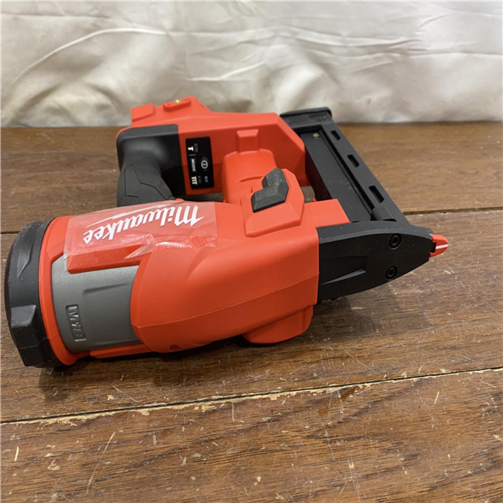 AS-IS MILWAUKEE M18 FUEL 18-Volt Lithium-Ion Brushless Cordless 18-Gauge 1/4 in. Narrow Crown Stapler (Tool-Only)