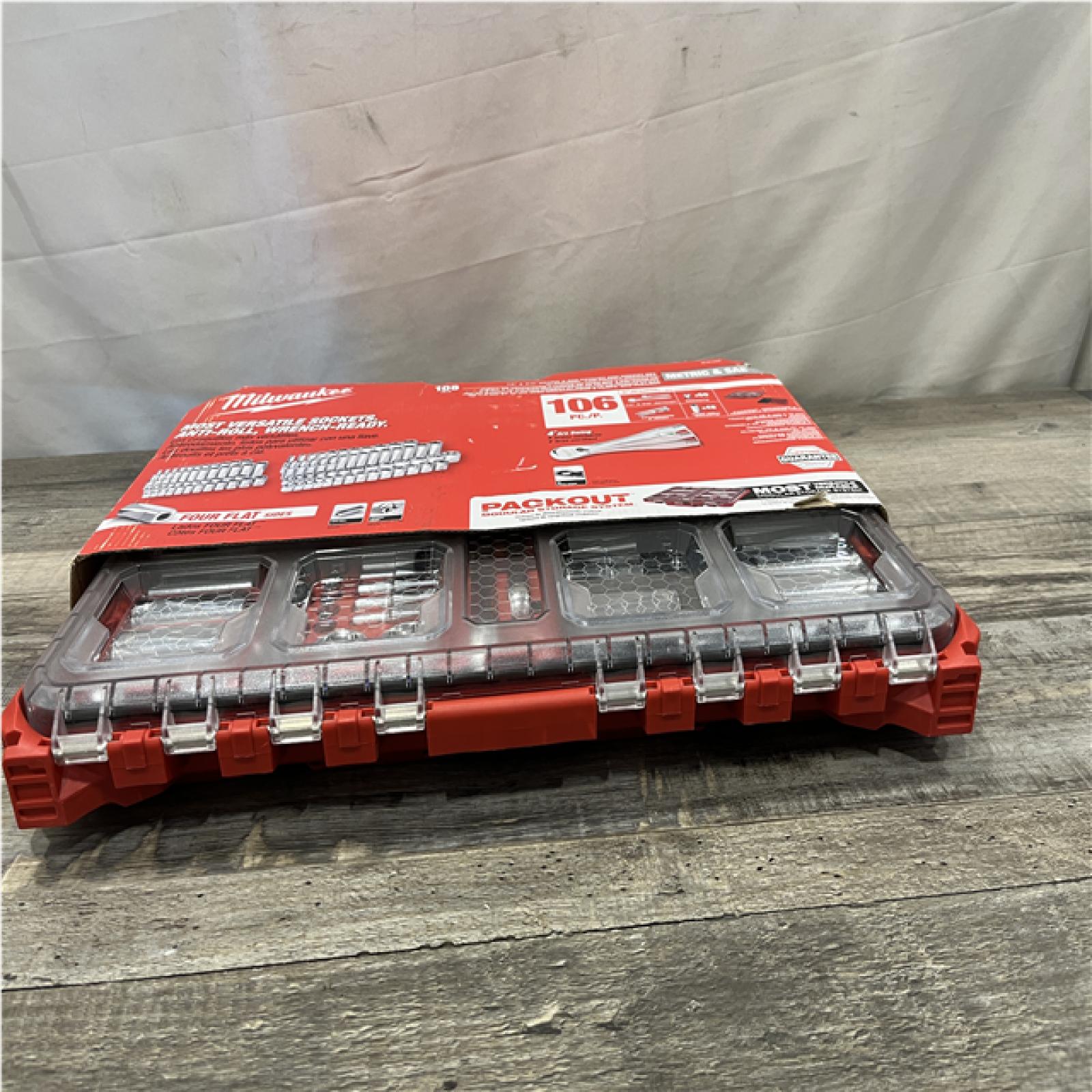 NEW - Milwaukee 3/8 in. and 1/4 in. Drive SAE/Metric Ratchet and Socket Mechanics Tool Set with PACKOUT Case (106-Piece)
