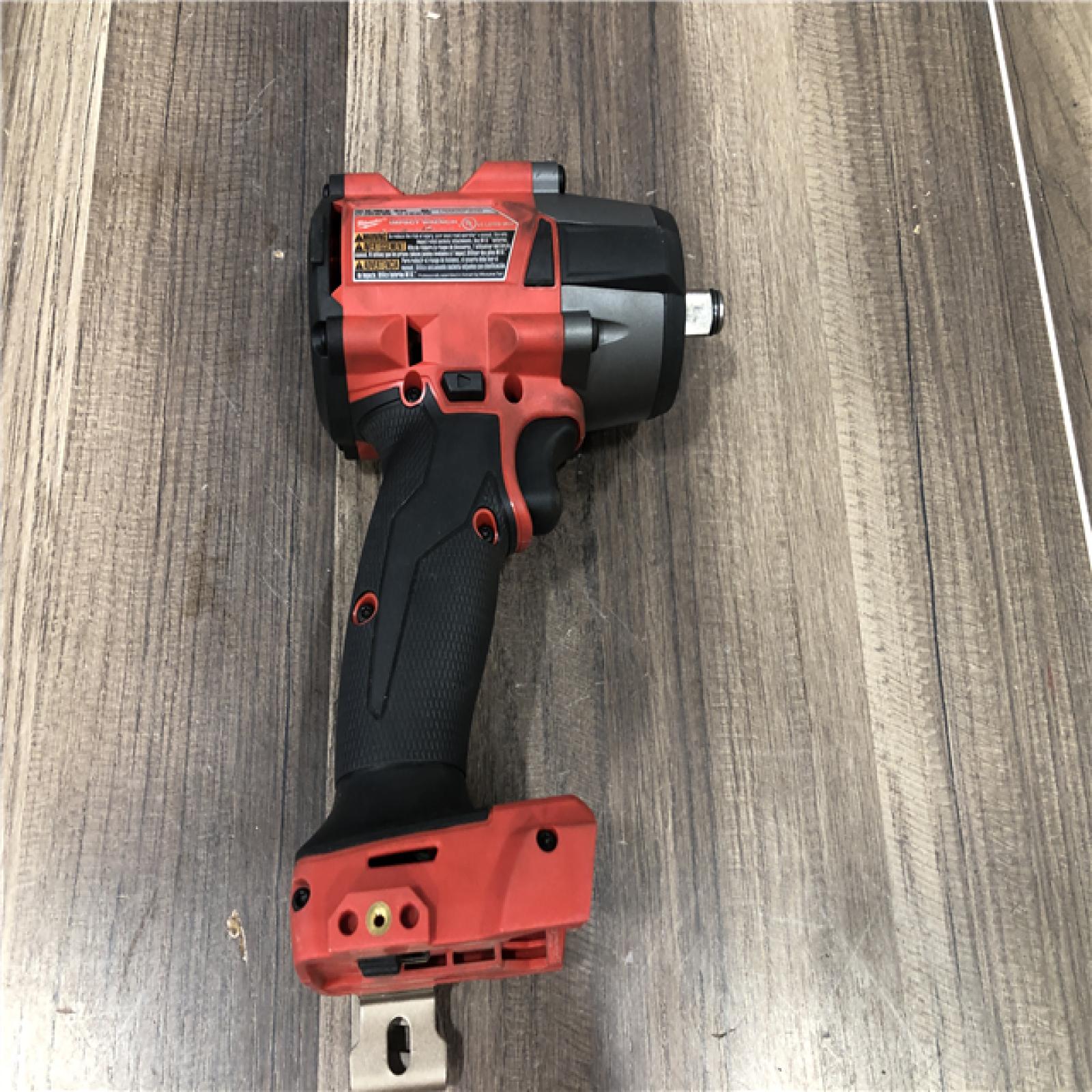 AS-IS Milwaukee FUEL Gen-2 18V Lithium-Ion Brushless Cordless Mid Torque 1/2 in. Impact Wrench w/Friction Ring (Tool-Only)