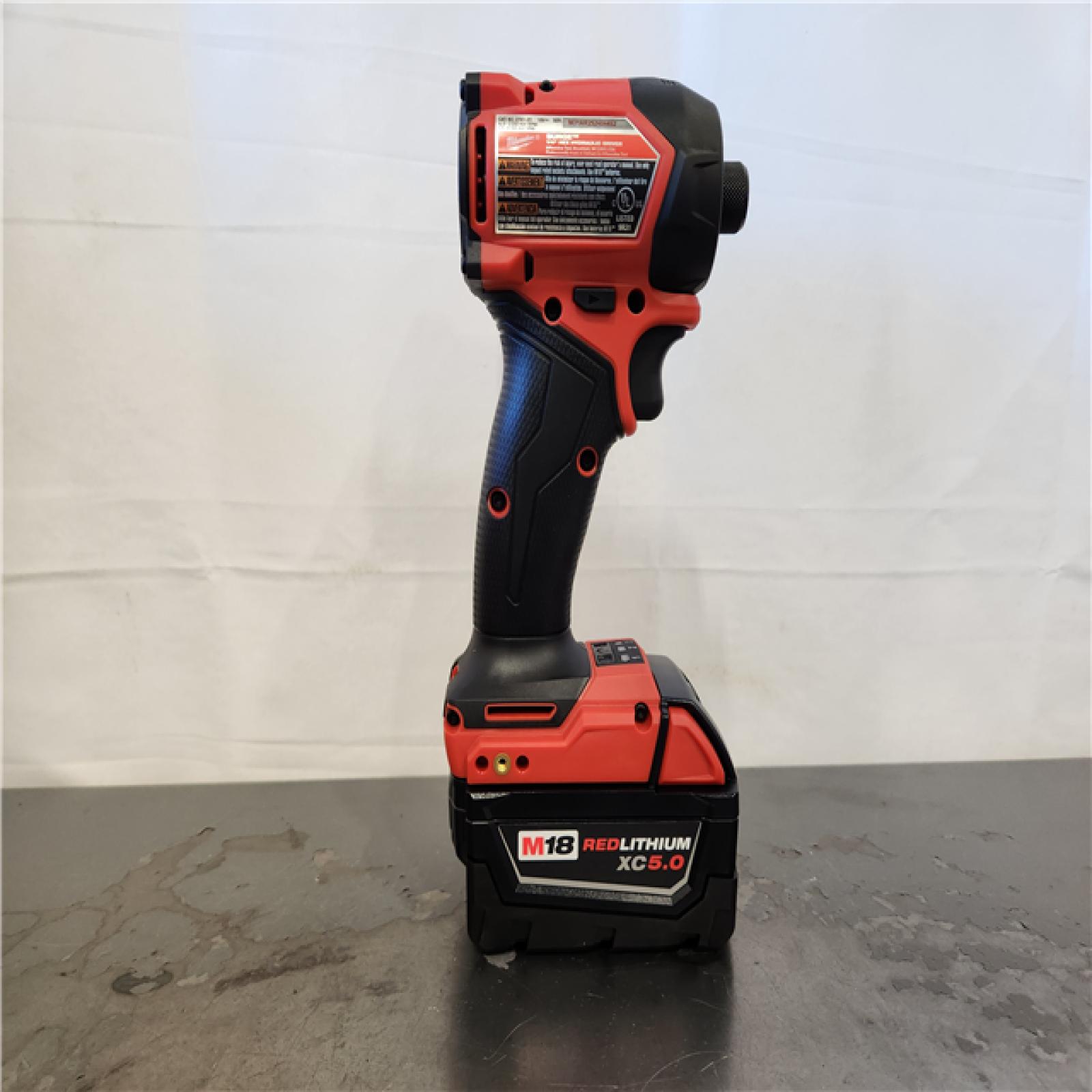 AS-IS-  Milwaukee FUEL SURGE 18V Lithium-Ion Brushless Cordless 1/4 in. Hex Impact Driver with (2) 5.0 Ah Battery and Charger