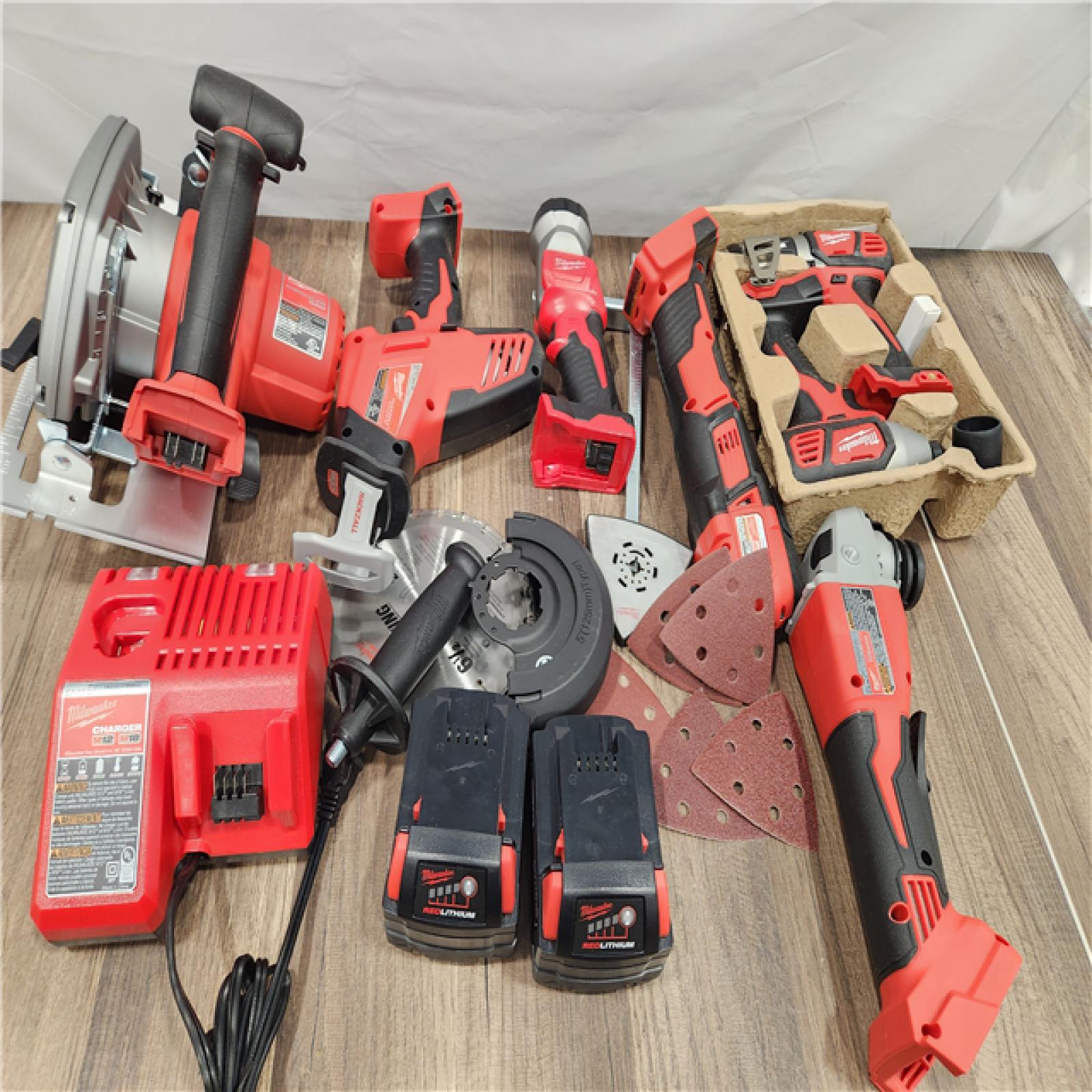 NEW! - M18 18-Volt Lithium-Ion Cordless Combo Kit 7-Tool with 2-Batteries, Charger and Tool Bag