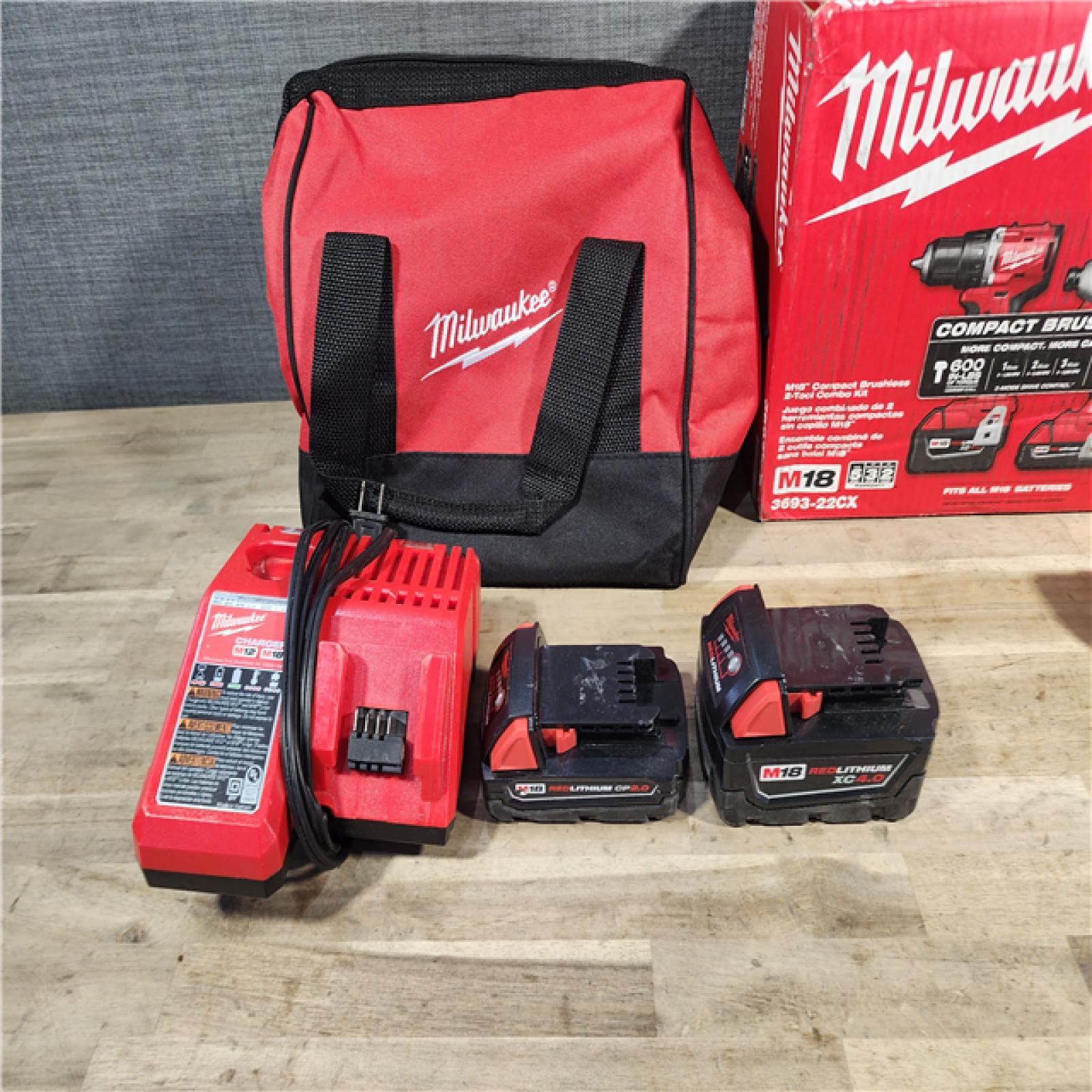 HOUSTON LOCATION - AS-IS M18 18-Volt Lithium-Ion Brushless Cordless Compact Hammer Drill/Impact Combo Kit (2-Tool) with (2) Batteries, Bag
