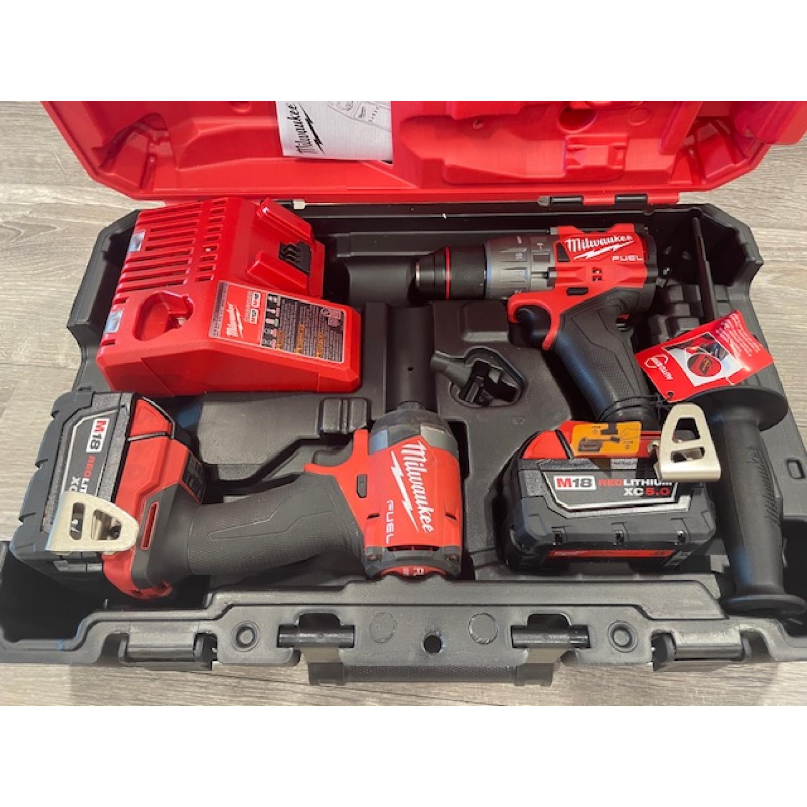 AS-IS Milwaukee FUEL 18V Lithium-Ion Brushless Cordless Hammer Drill and Impact Driver Combo Kit