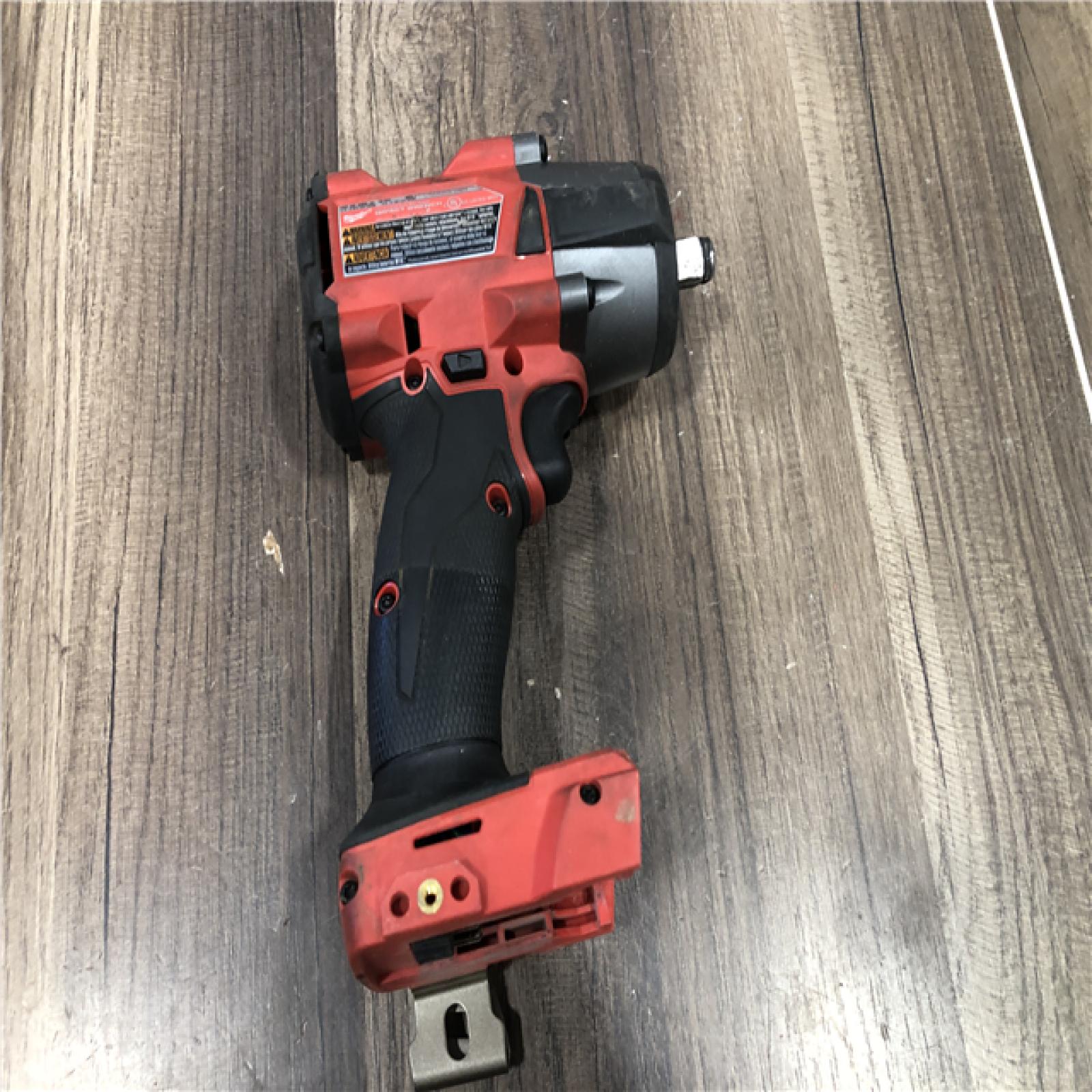 AS-IS Milwaukee FUEL Gen-2 18V Lithium-Ion Brushless Cordless Mid Torque 1/2 in. Impact Wrench w/Friction Ring (Tool-Only)