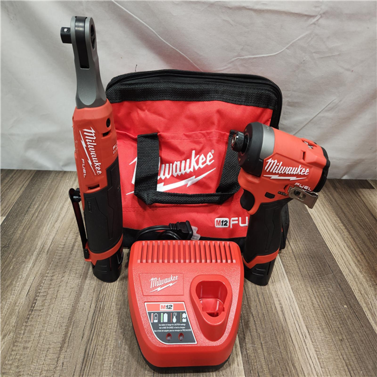 AS-IS- Milwaukee M12 FUEL 12V Lithium-Ion Cordless 3/8 in. Ratchet and 1/4 in. Impact Driver Kit